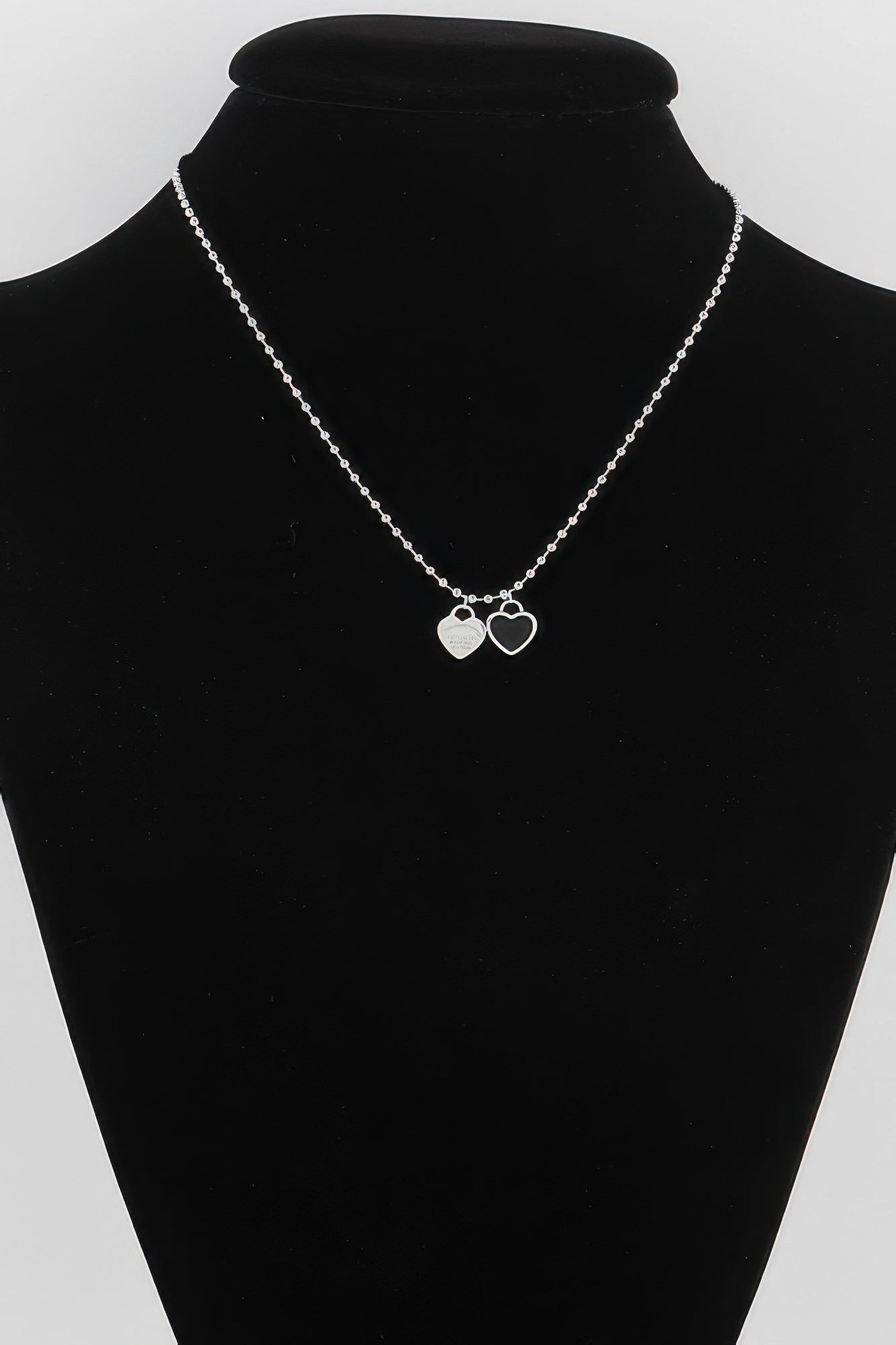 Elegant Heart Shap Pendant Necklace with silver chain and two white heart pendants