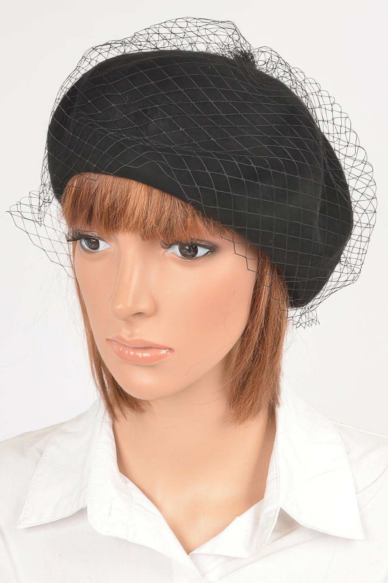 Black netted fashion cap with fine mesh veil and curved brim over head