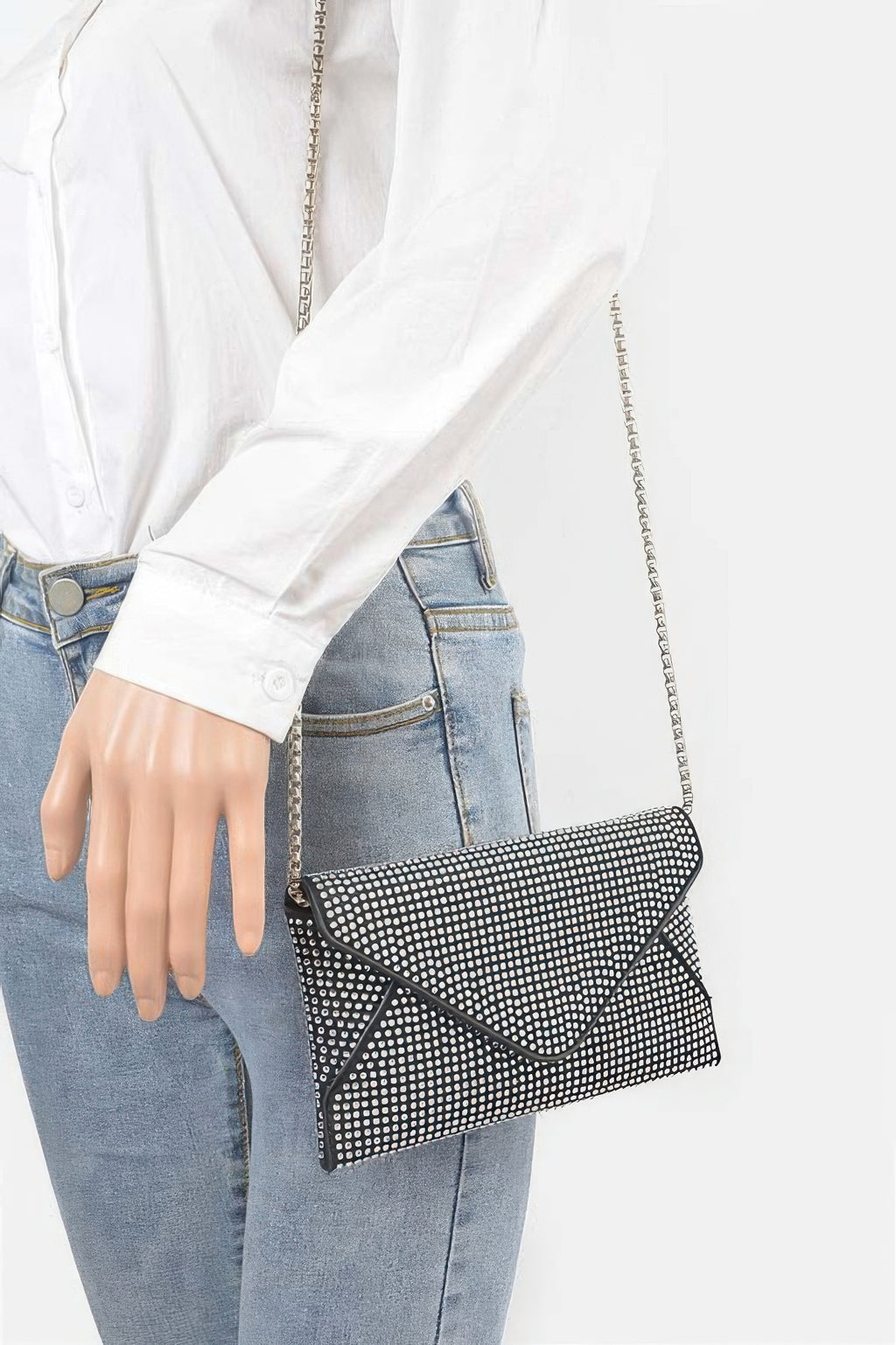Hot Fix Rhinestones Envelope Clutch in black, crossbody chain strap on model