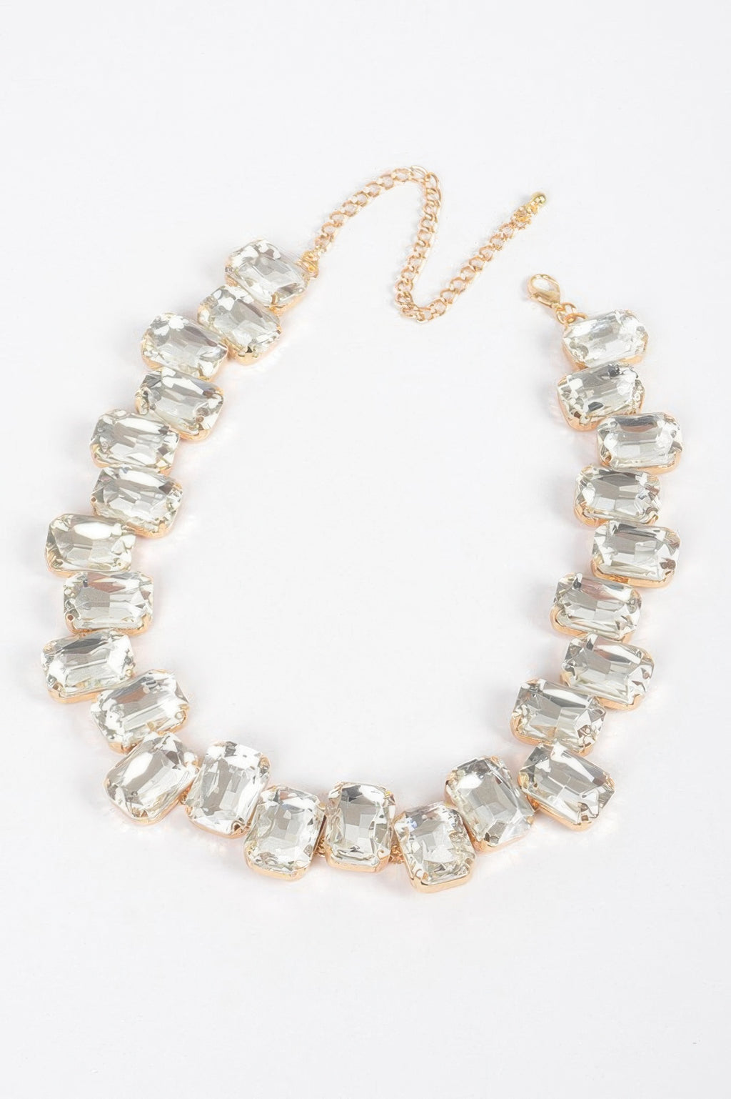 Clear stone bead tennis necklace with gold-tone chain and clasp, flexible links