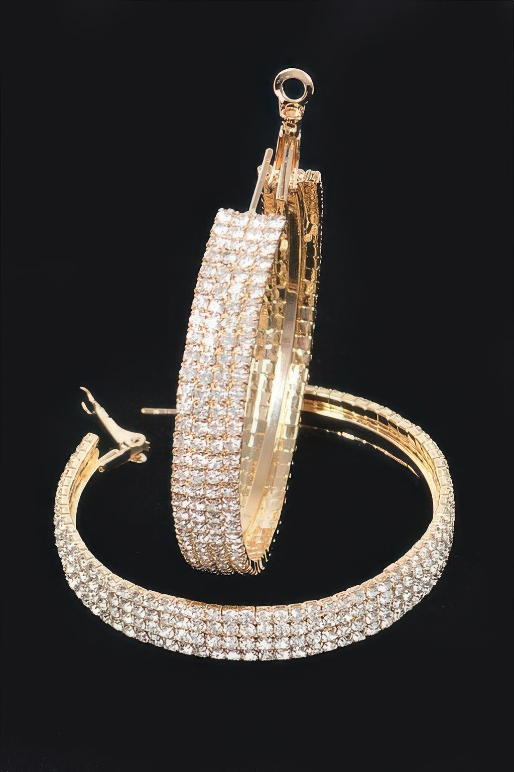 Gold-tone rhinestone hoop earring, thick pavé band with hinged clasp