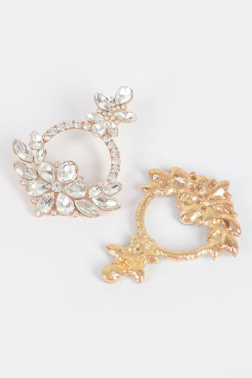 Rhinestone hoop earrings, clear stones with silver- and gold-tone floral clusters