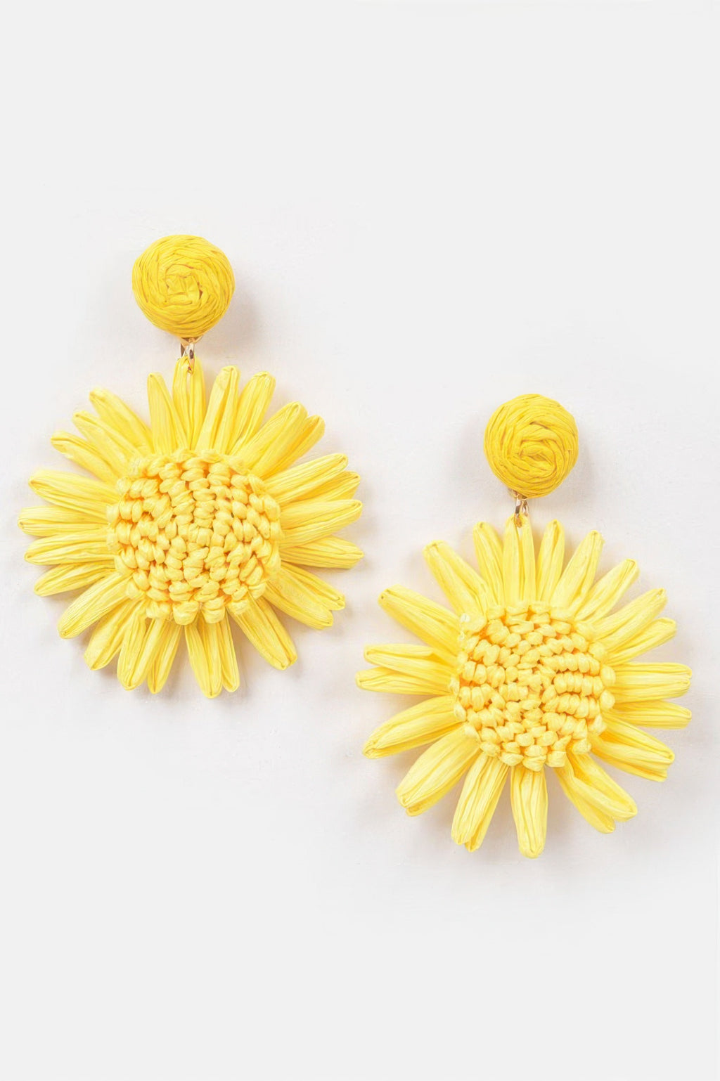 Yellow flower earrings with woven round centers and long petal fibers