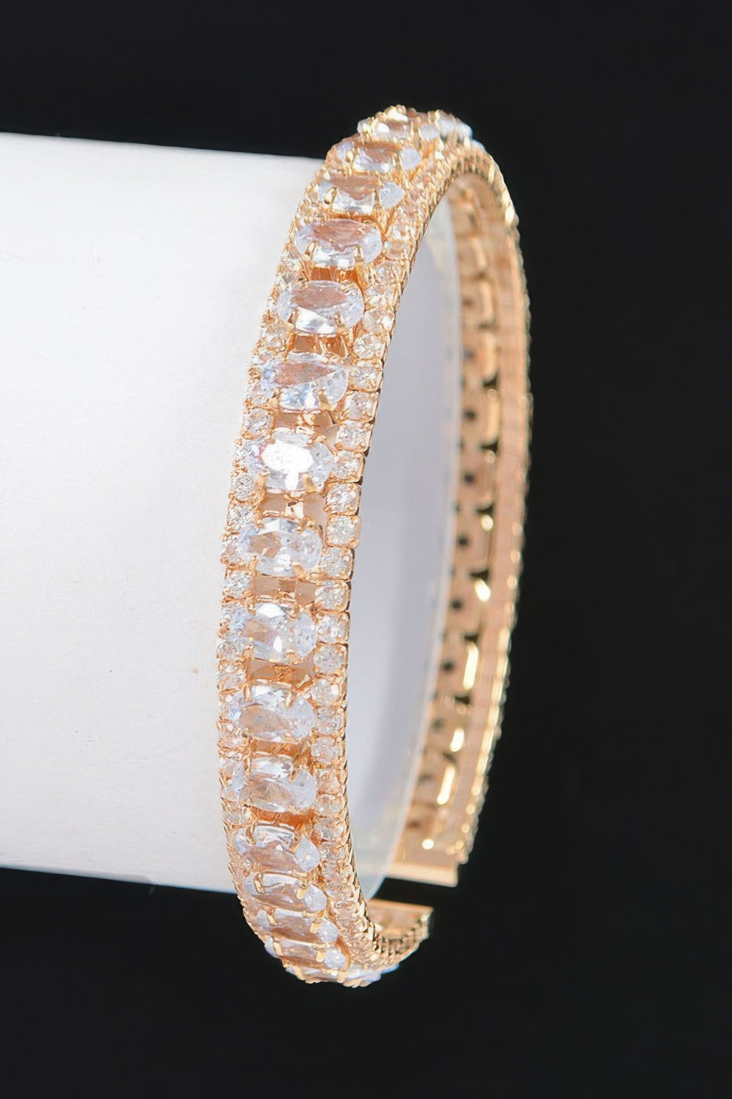 Gold-toned cubic zirconia bracelet with clear square stones, open cuff