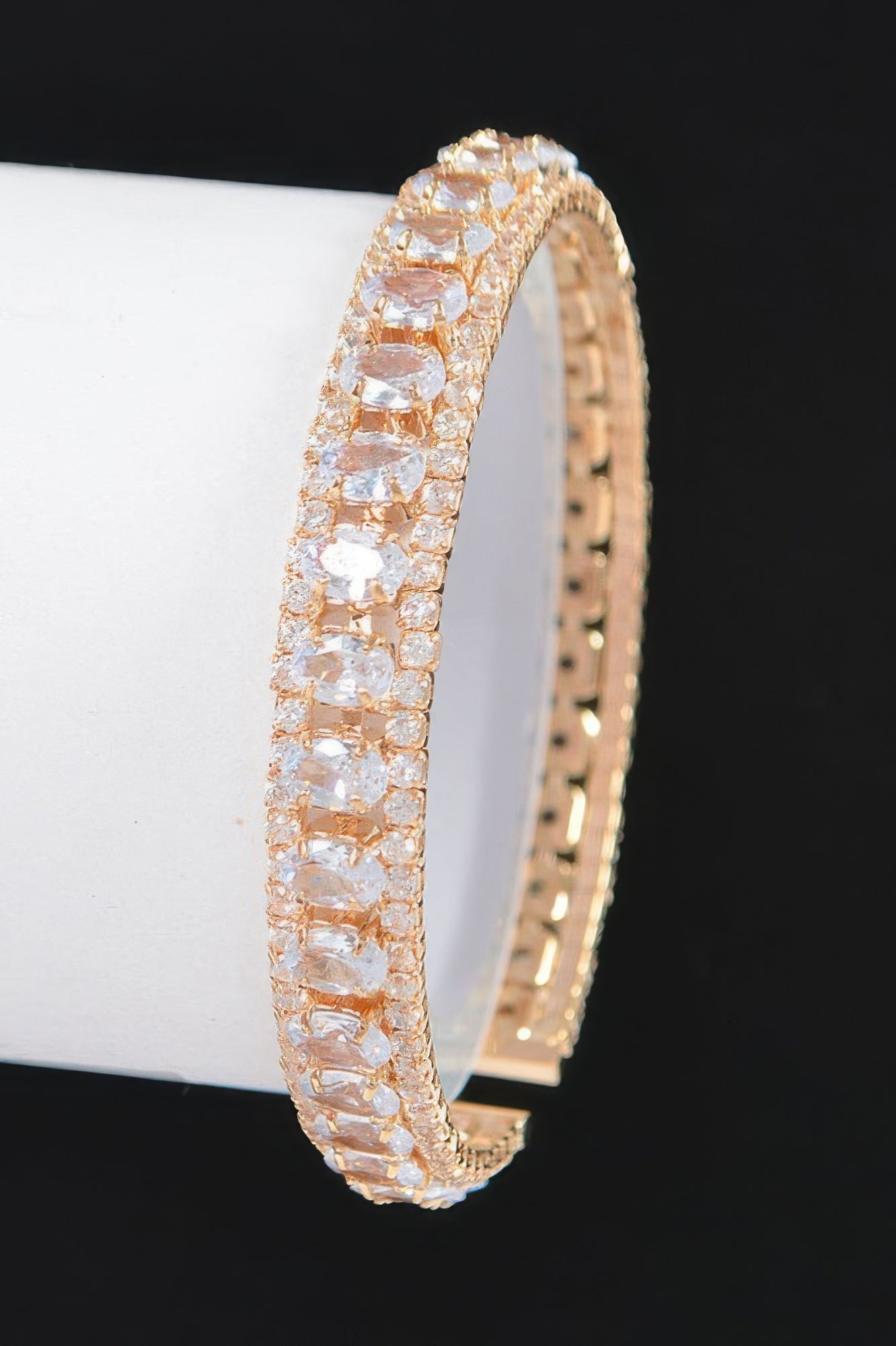 Gold-toned cubic zirconia bracelet with clear square stones, open cuff