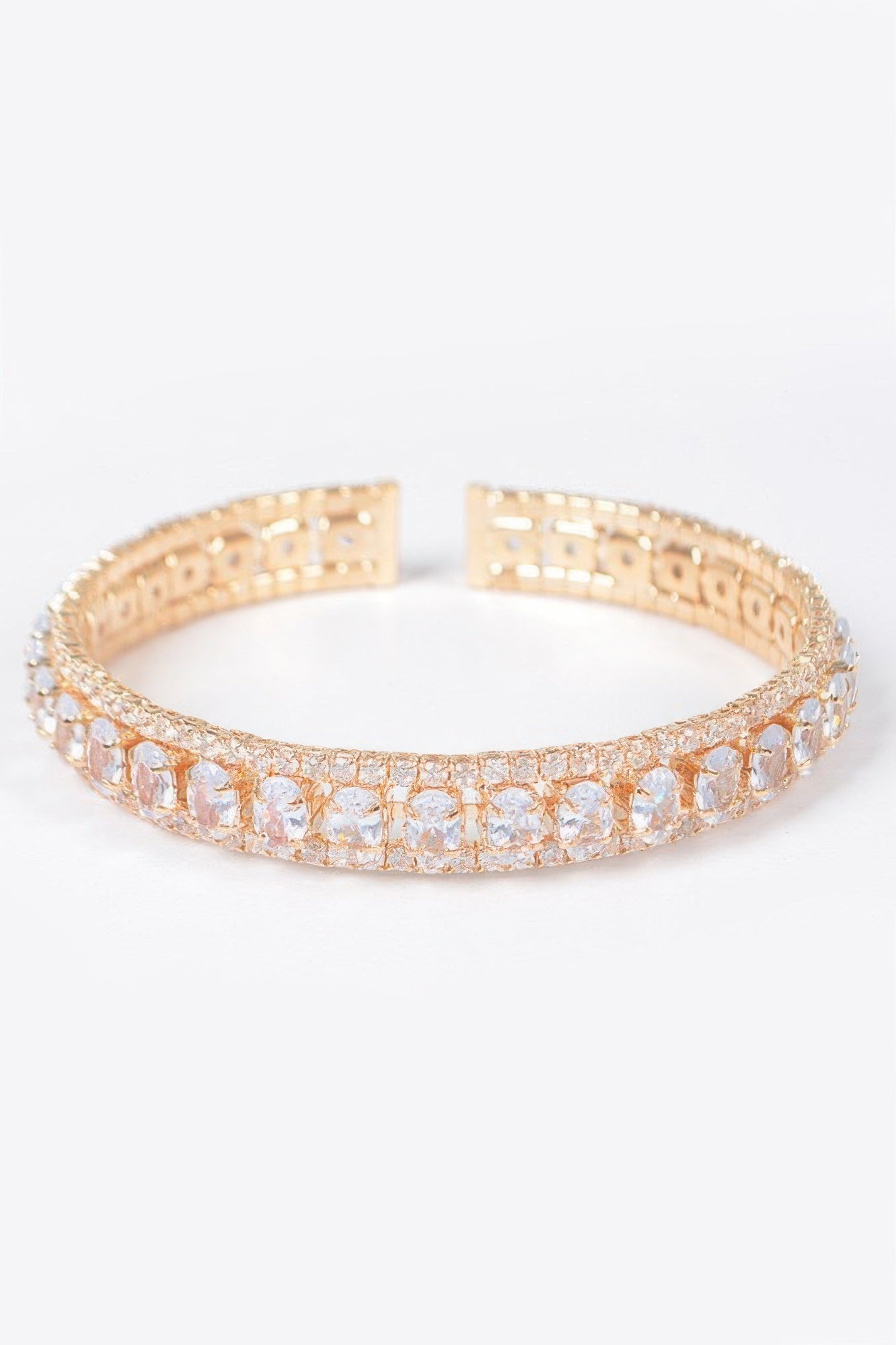 Cubic zirconia bracelet with clear square stones in gold tone, full band view
