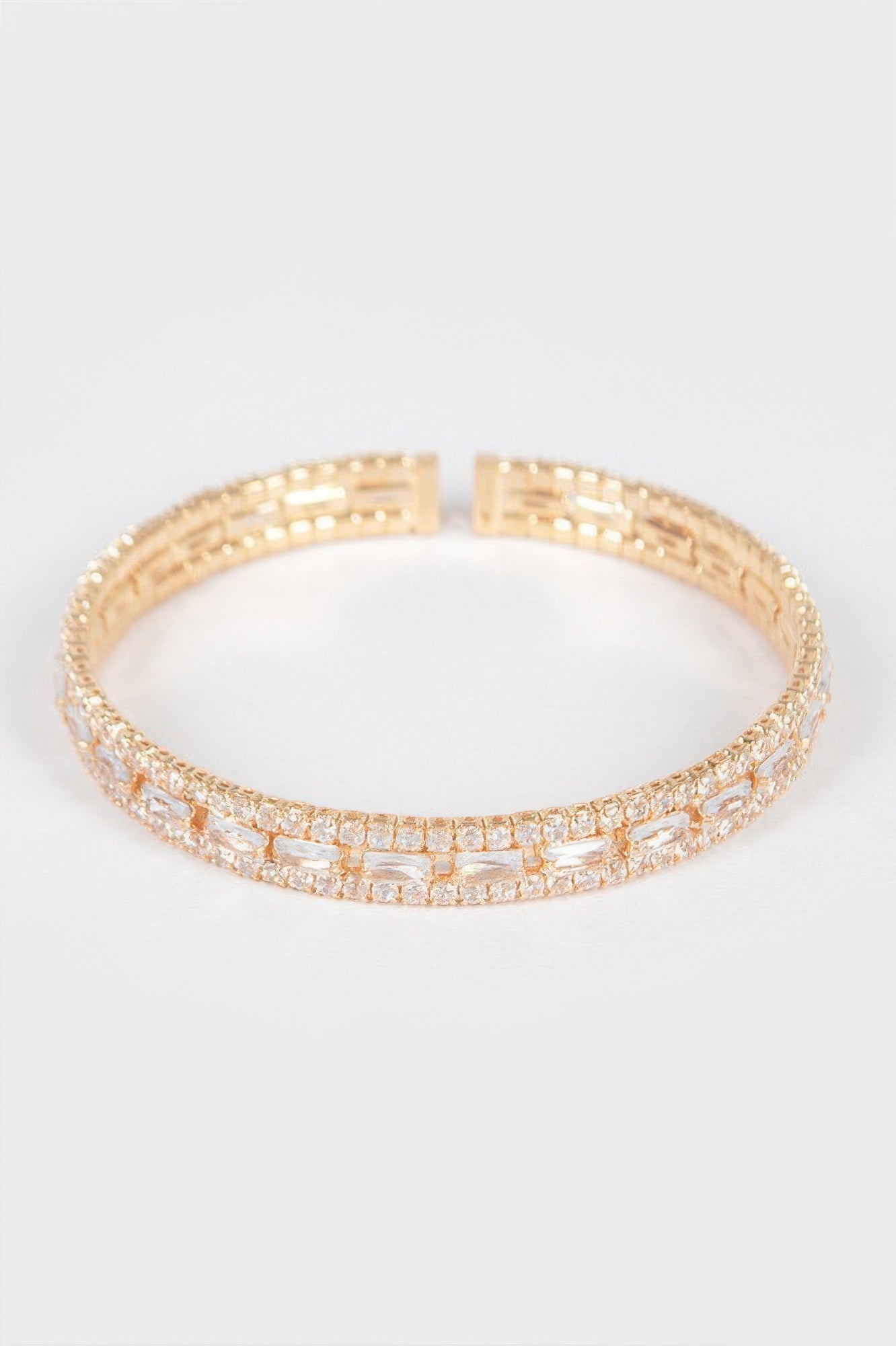 Clear gold Cubic Zirconia Bracelet with pavé square-cut stones and hinged band style