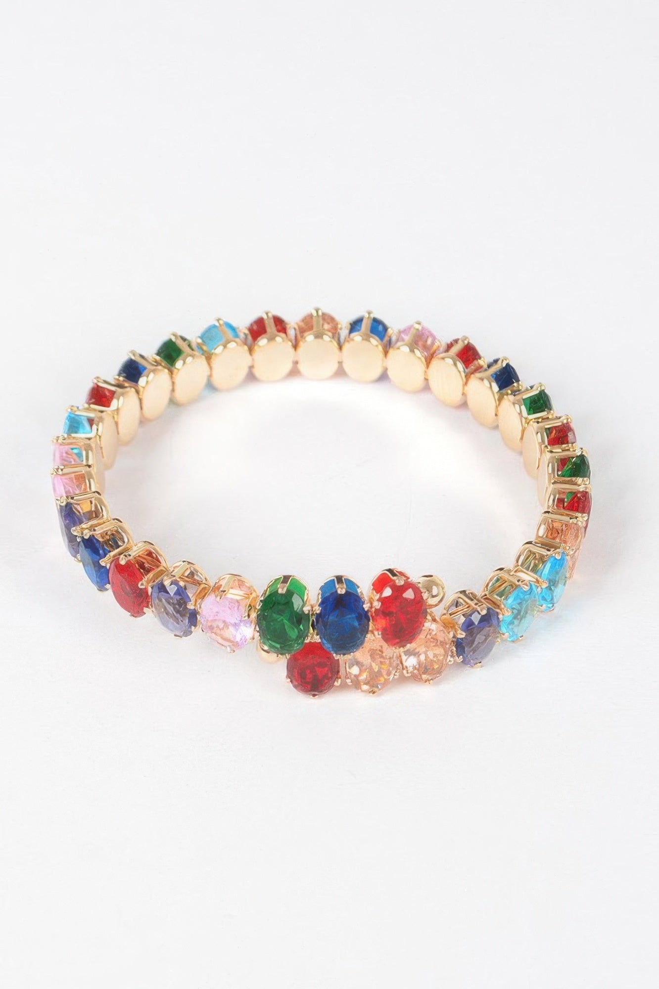 Multicolor cubic zirconia bracelet with round stones in green, red, blue, and gold-tone