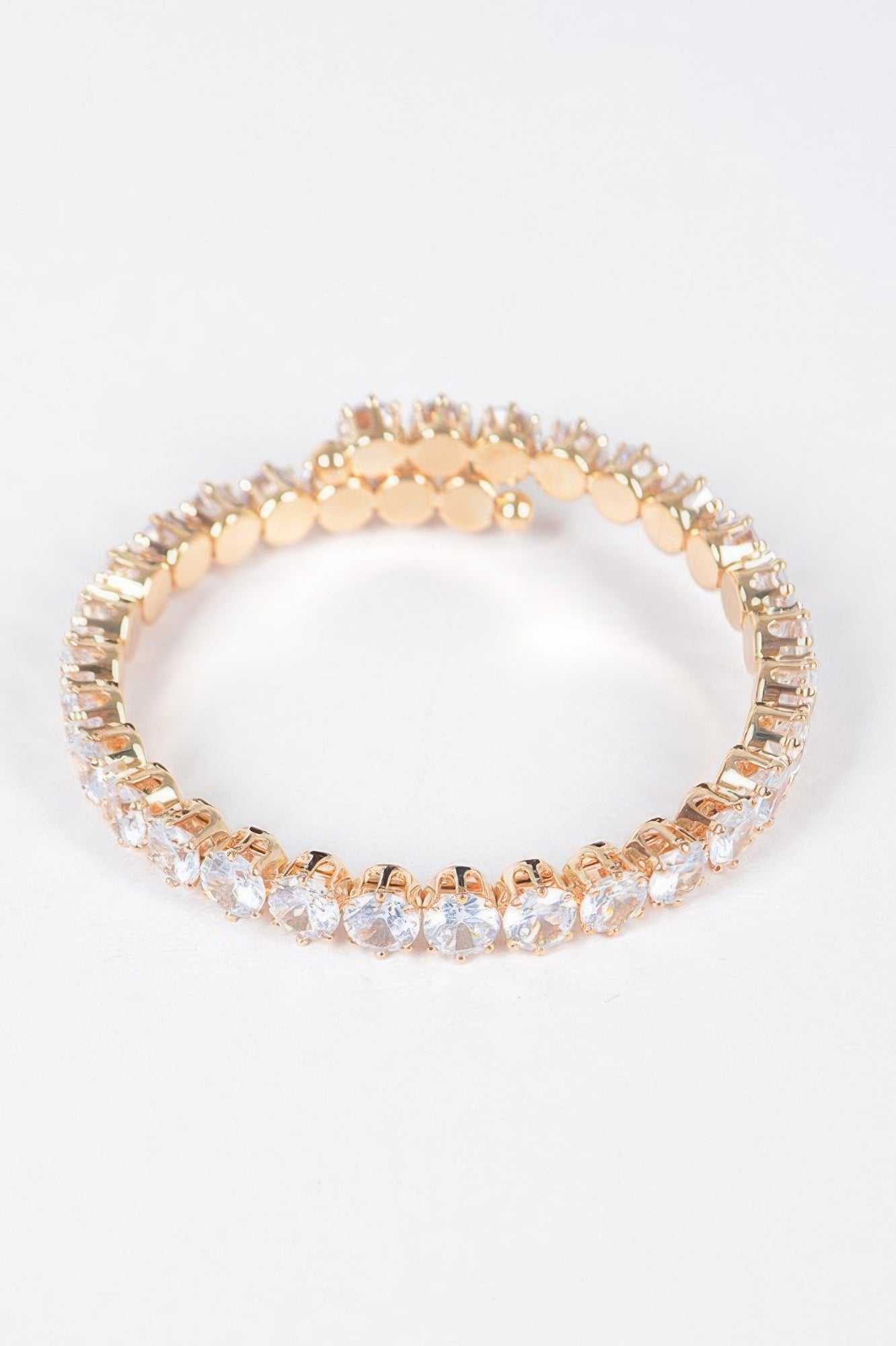 Clear cubic zirconia tennis bracelet, rose-gold tone with round stones