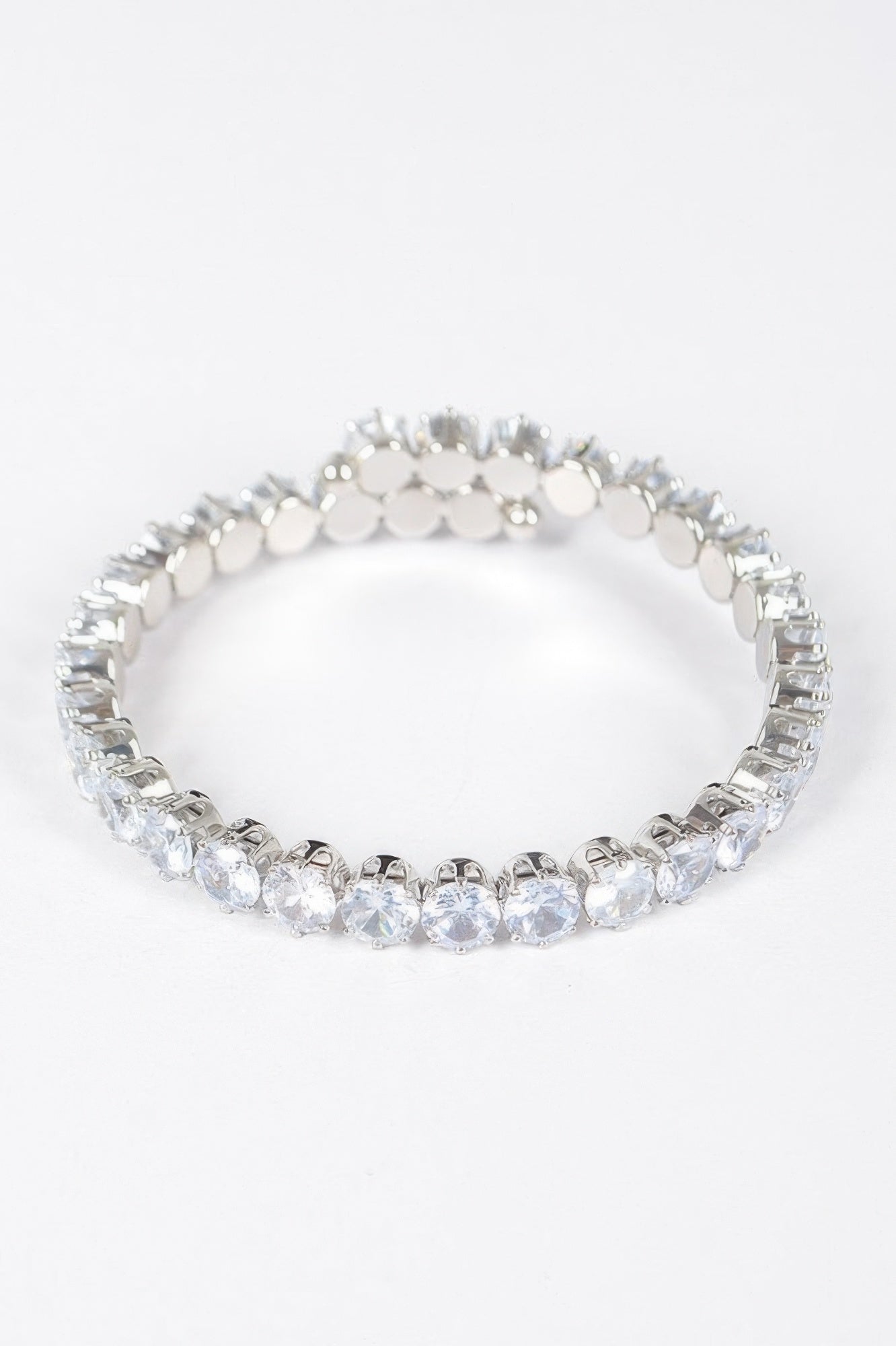 Silver-tone clear cubic zirconia tennis bracelet with evenly spaced round stones