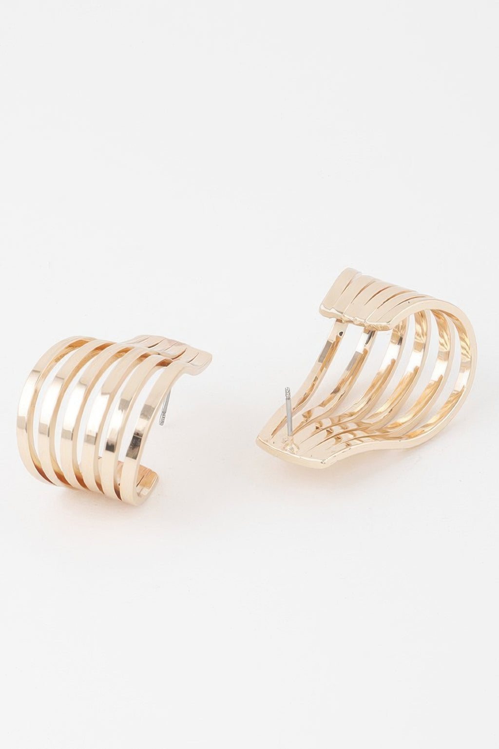 Open cage hoop earrings, gold tone, curved openwork ridges from side