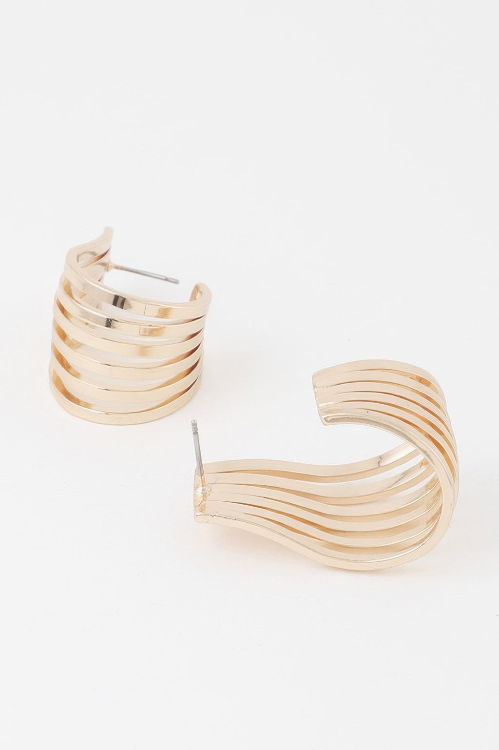 Open cage hoop earrings, gold tone, close-up showing open front cage