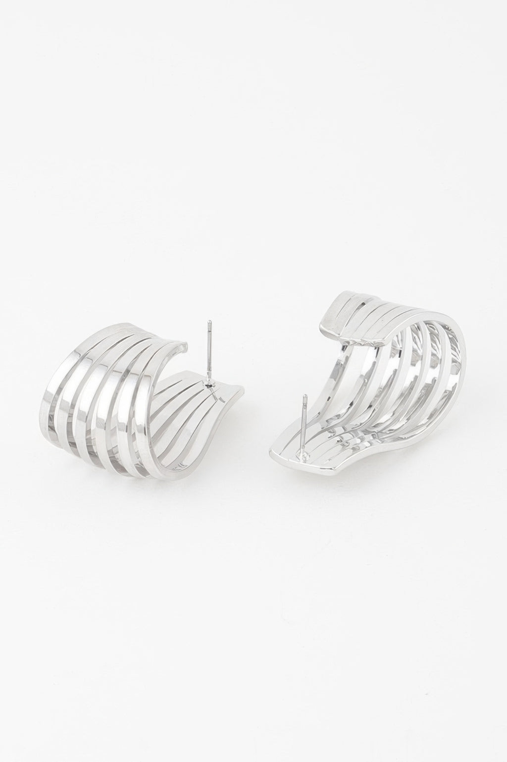 Open cage hoop earrings in silver tone with stacked bar cage hoops
