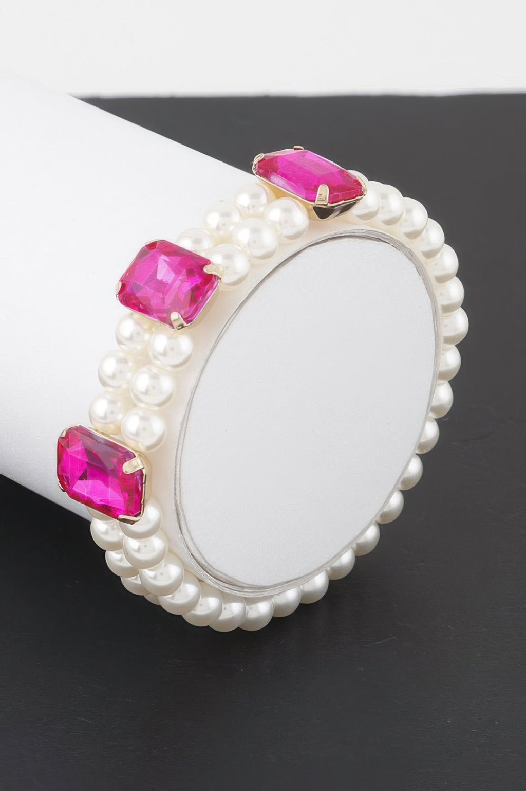 Pearl rhinestone bracelet with hot pink crystal square stones and gold-tone accents