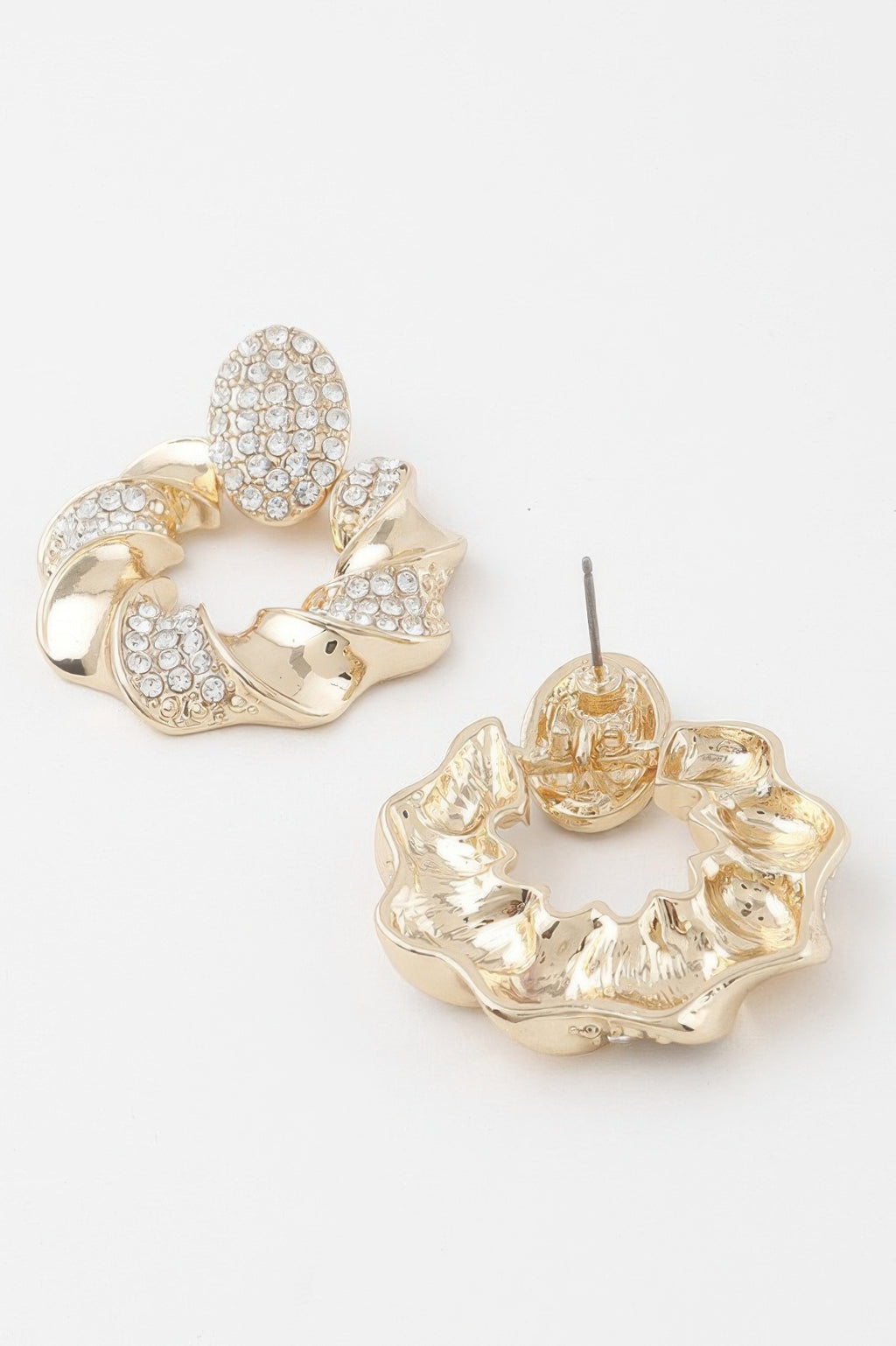 Twisted jewel wreath earrings, gold-tone front with clustered clear rhinestones and open wreath.