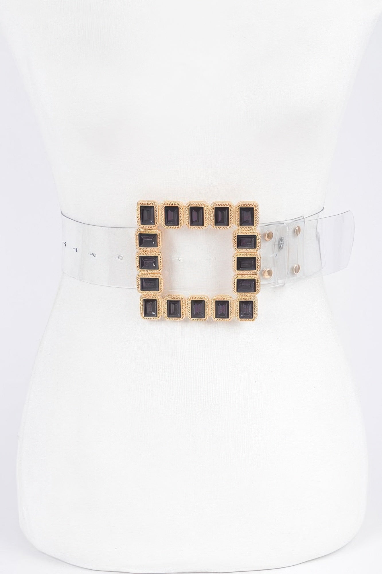 Square dark gem buckle faux leather belt with gold-tone setting on clear strap