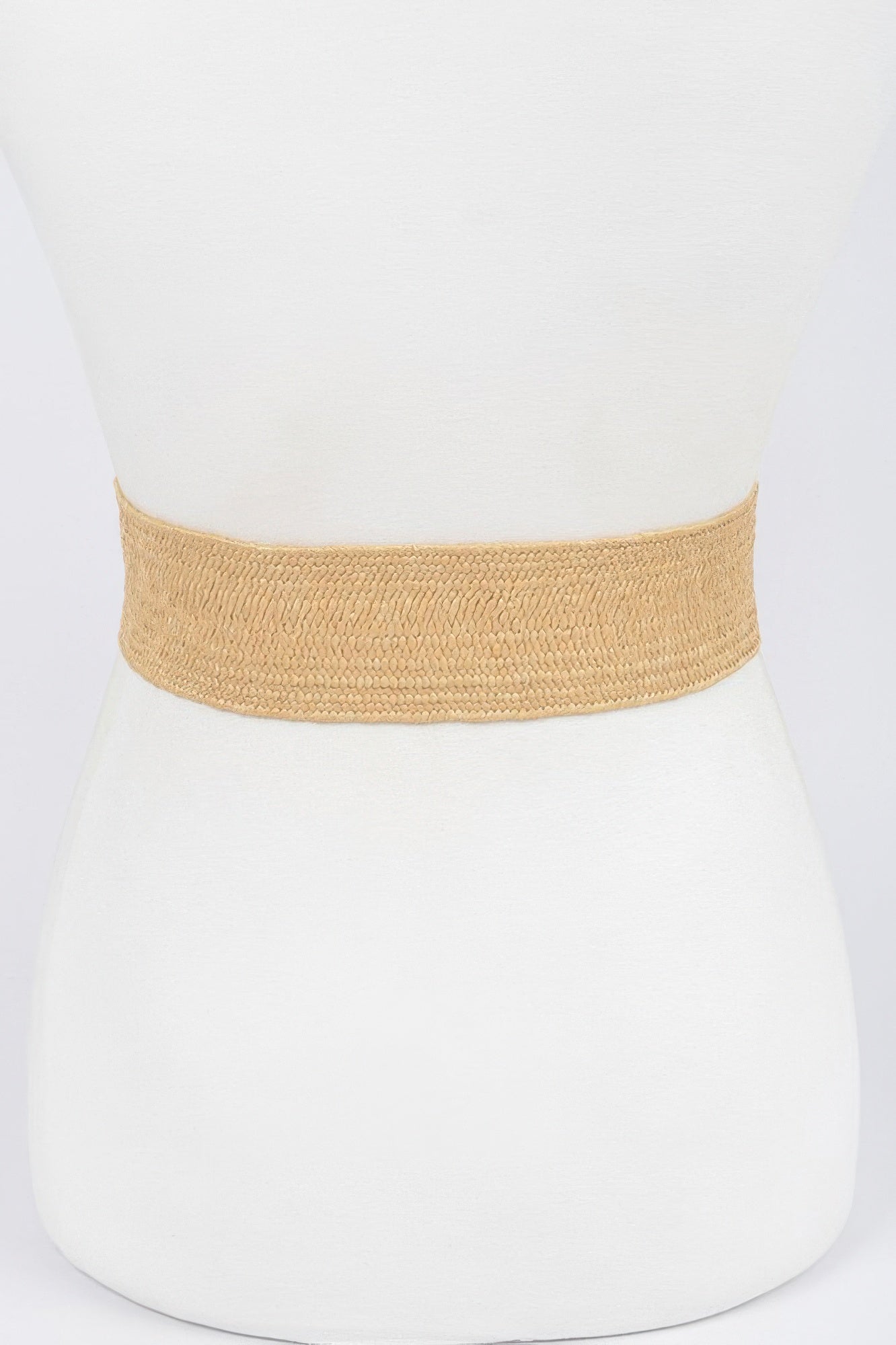 Beige stretch straw belt waistband, no buckle visible