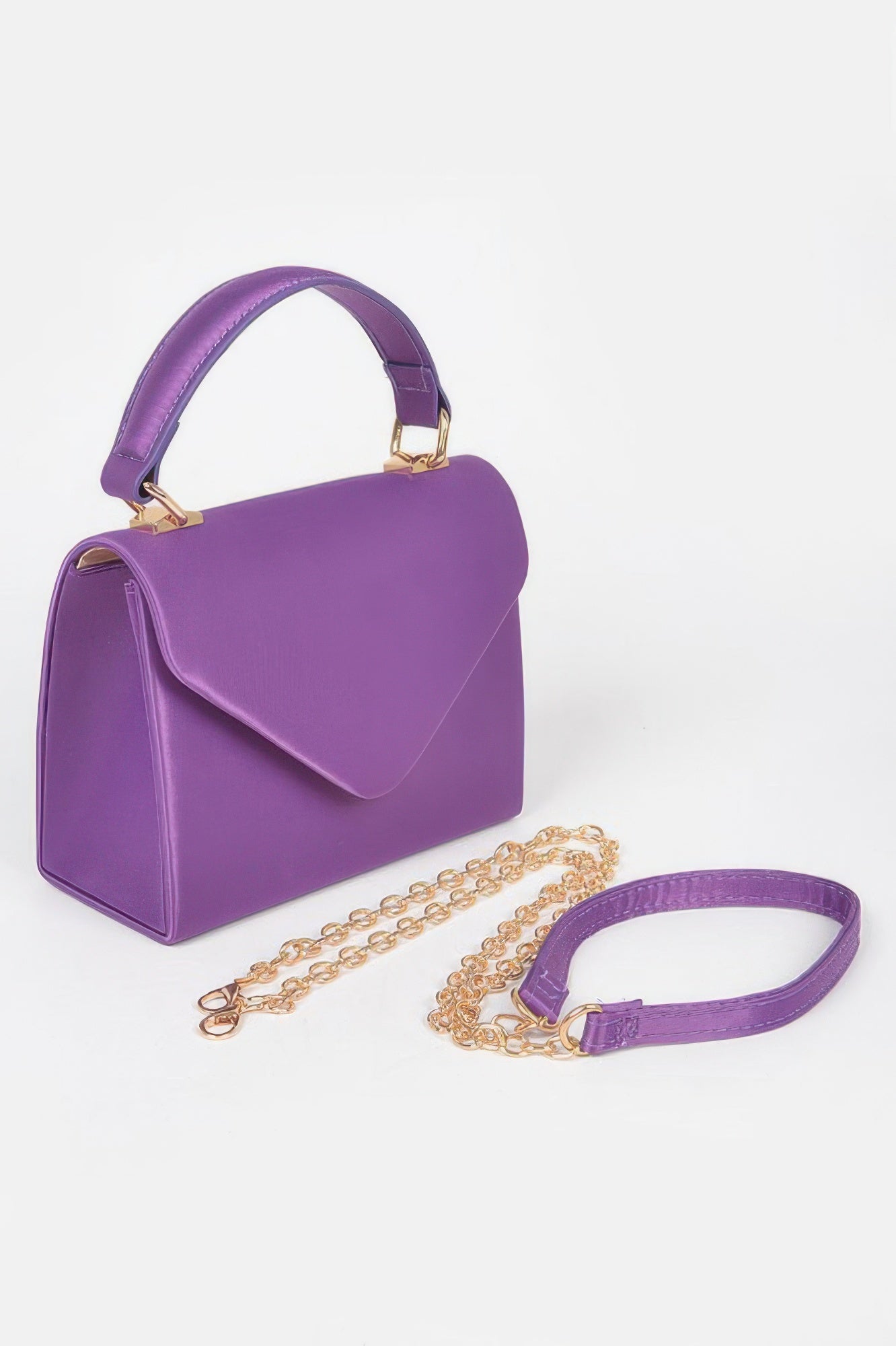 Purple satin mini flap crossbody bag with top handle, gold hardware, and chain strap.