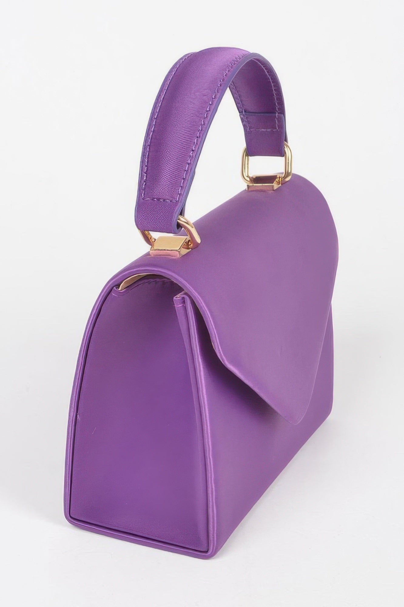 Purple satin crossbody bag, side view with top handle and flap detail, gold hardware.