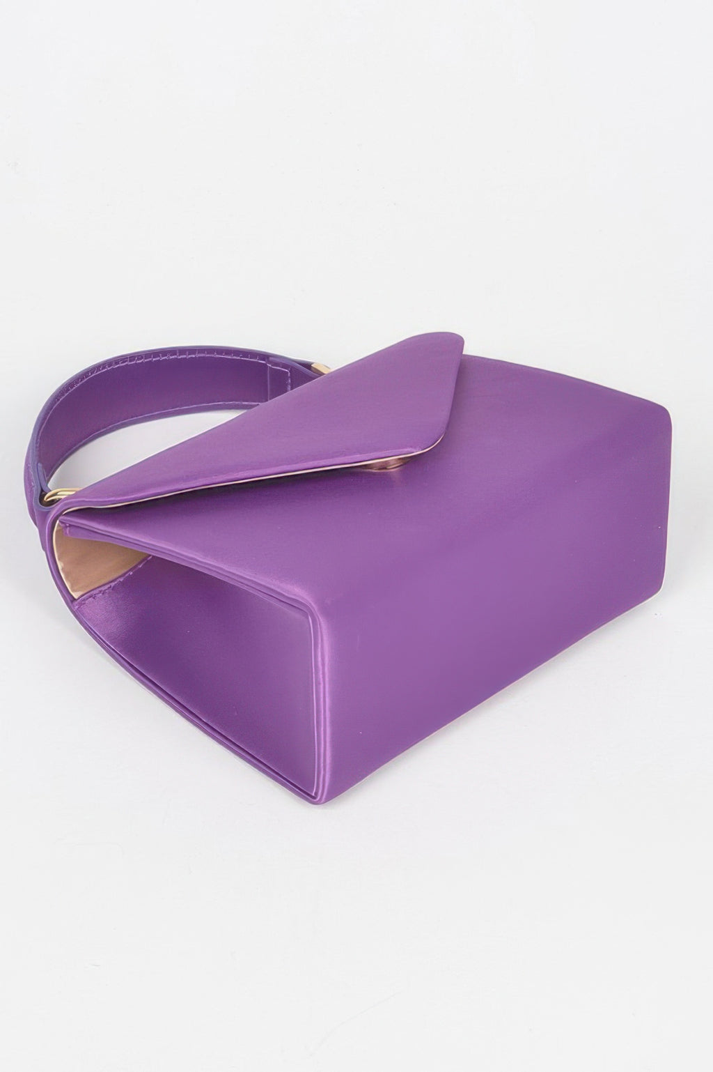 Purple satin flap crossbody bag shown from the top with gold clasp detail.