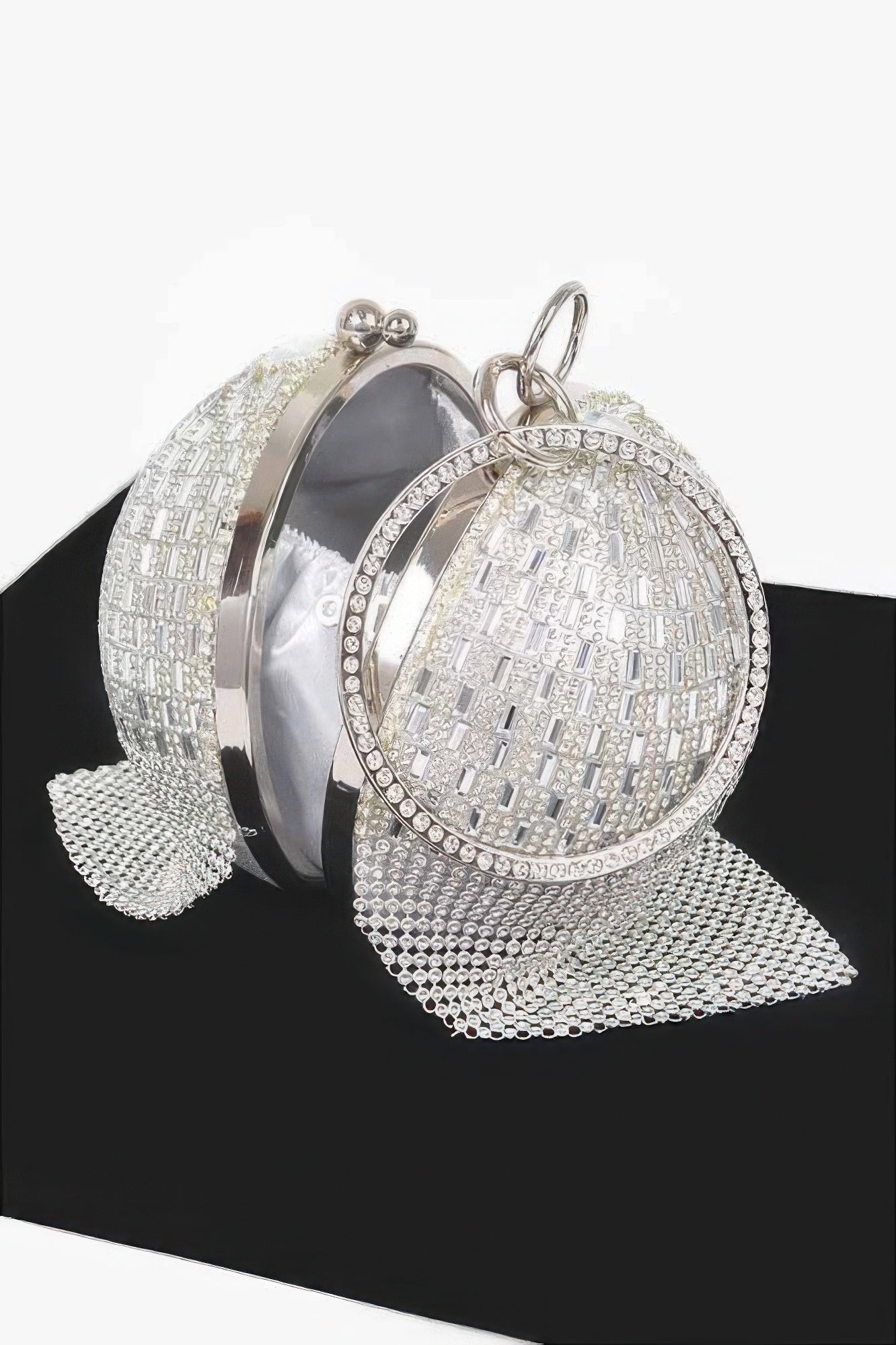Silver rhinestone round ball clutch with ring clasp and long chain strap