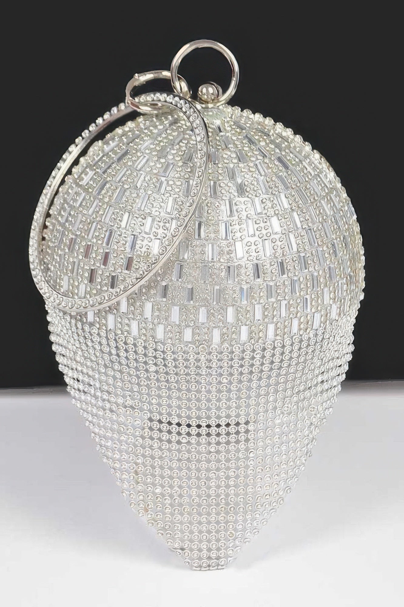 Silver rhinestone round ball clutch with front decorative panel and ring handle