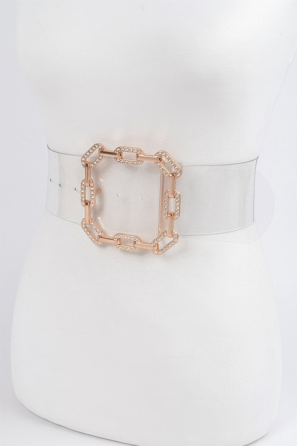 Transparent belt with gold rhinestone buckle on mannequin, waist view