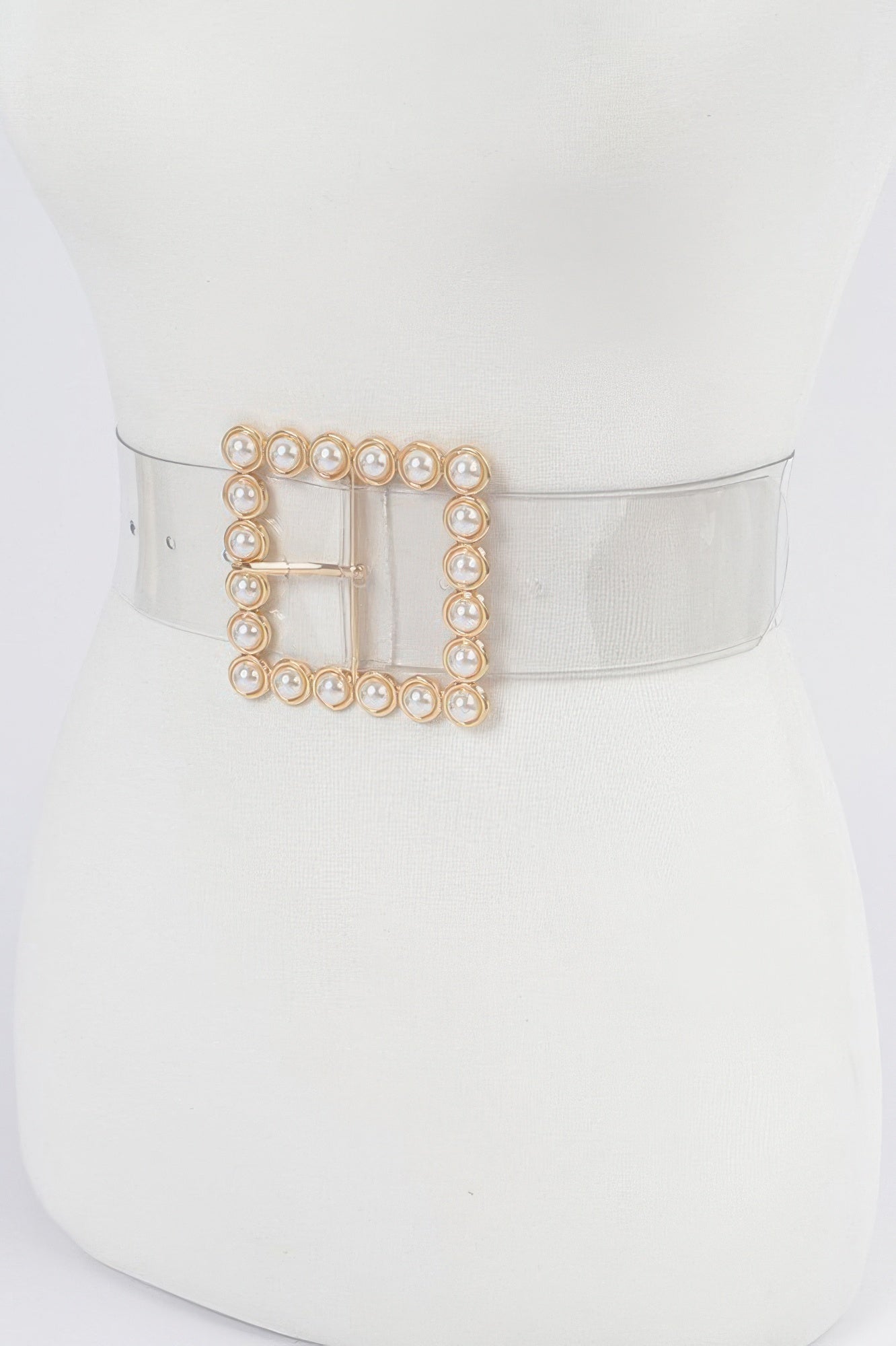 Pearl beaded square buckle on a clear stretch belt band