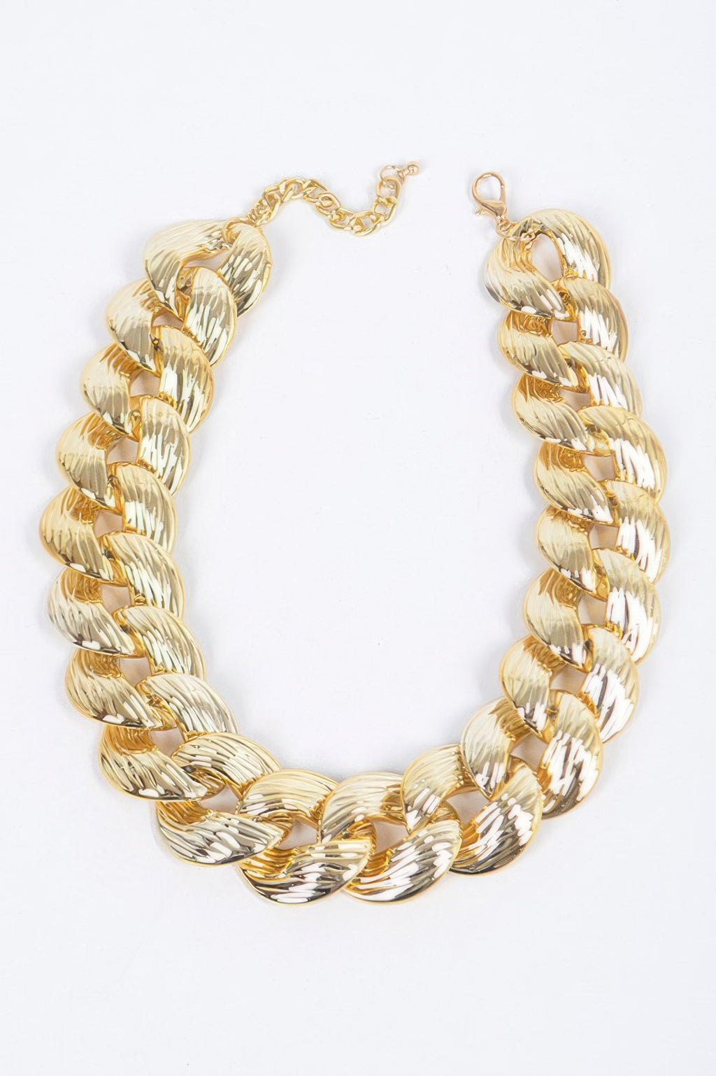 Oversized gold chain necklace with extender clasp, flat oval link design