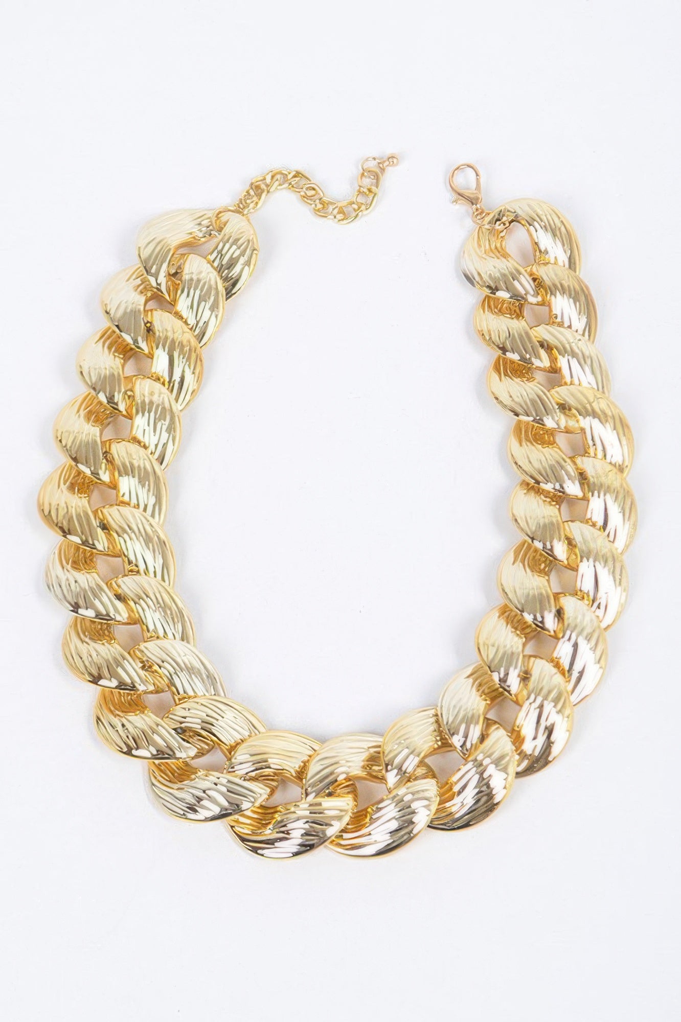 Oversized gold chain necklace with extender clasp, flat oval link design