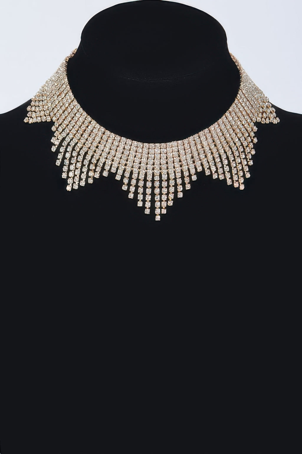 Silver rhinestone drop choker on bust, multi-row fringe tassels