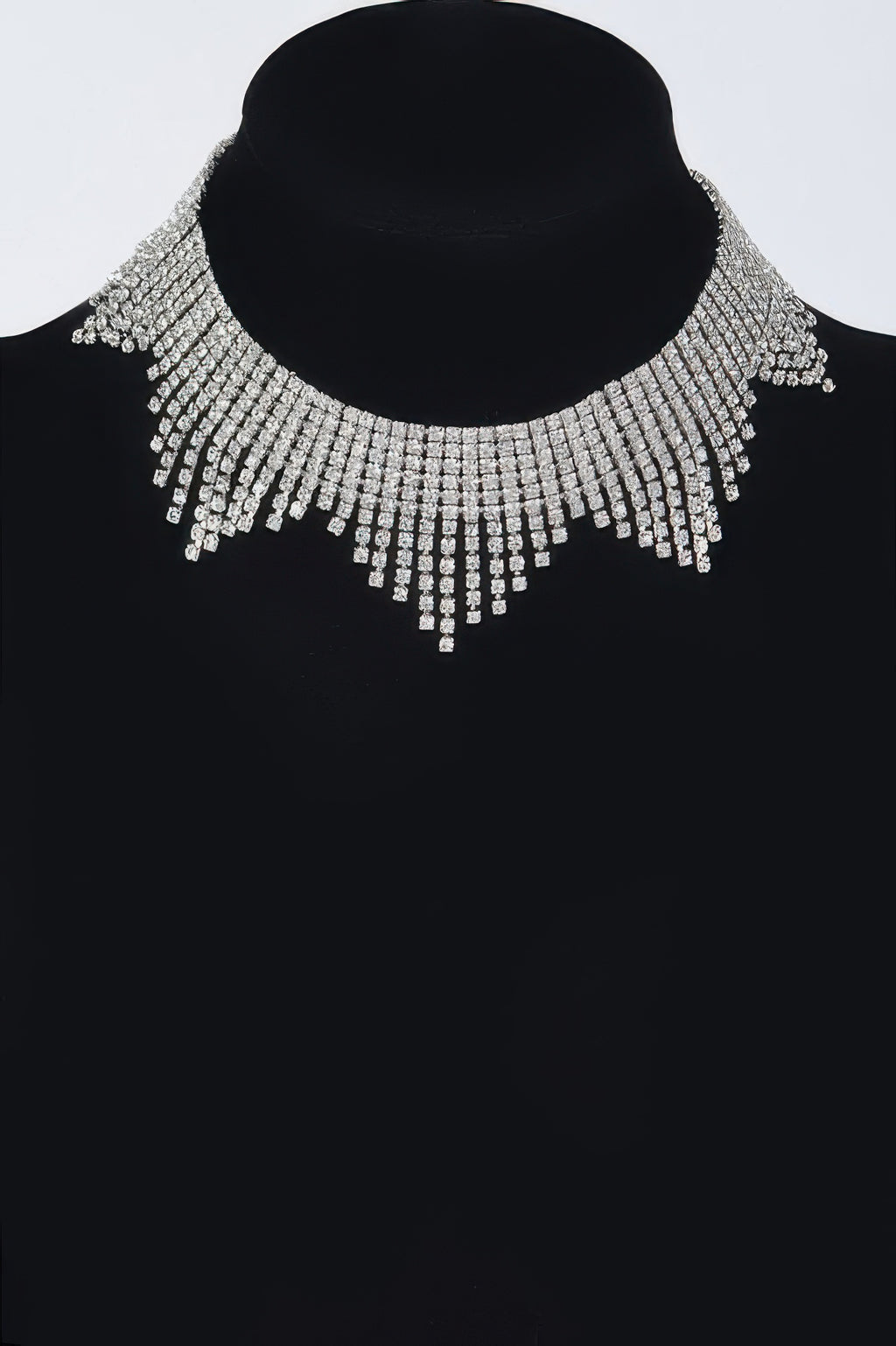 Silver rhinestone choker with dangling rectangular fringe rows and V-shaped drops