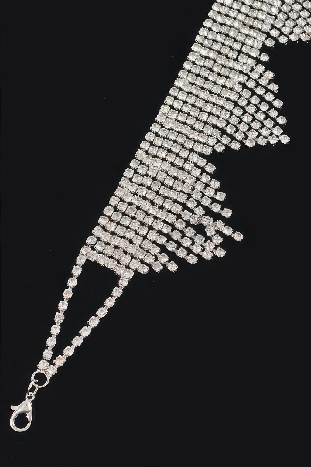 Silver rhinestone fringe drop row detail with oval clasp and extender chain