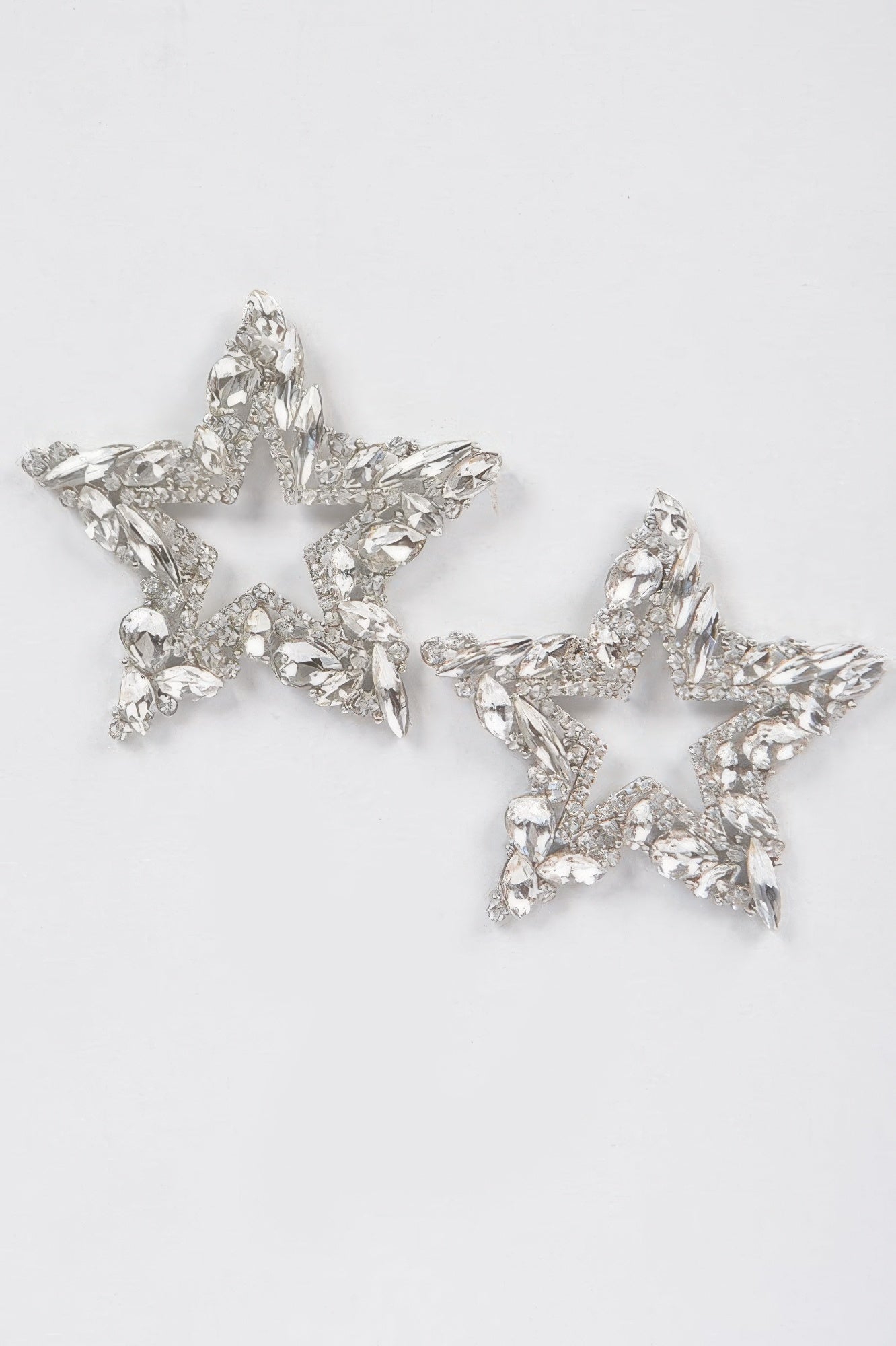 Rhinestone star earrings, silver-tone pair with wide crystal marquise details