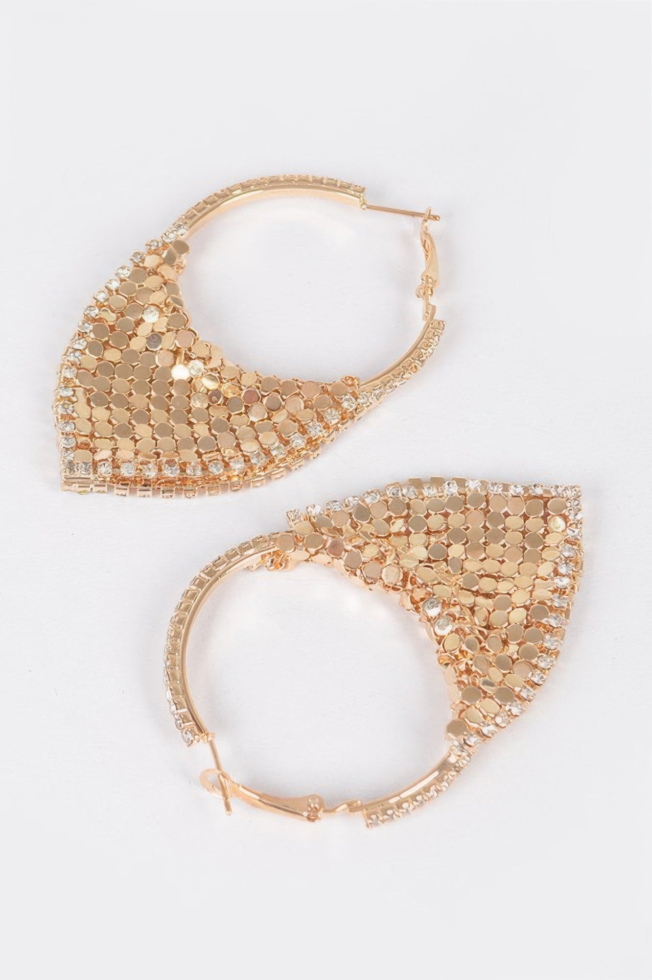 Linked metal earrings, gold-tone hoop with curved mesh triangle detail