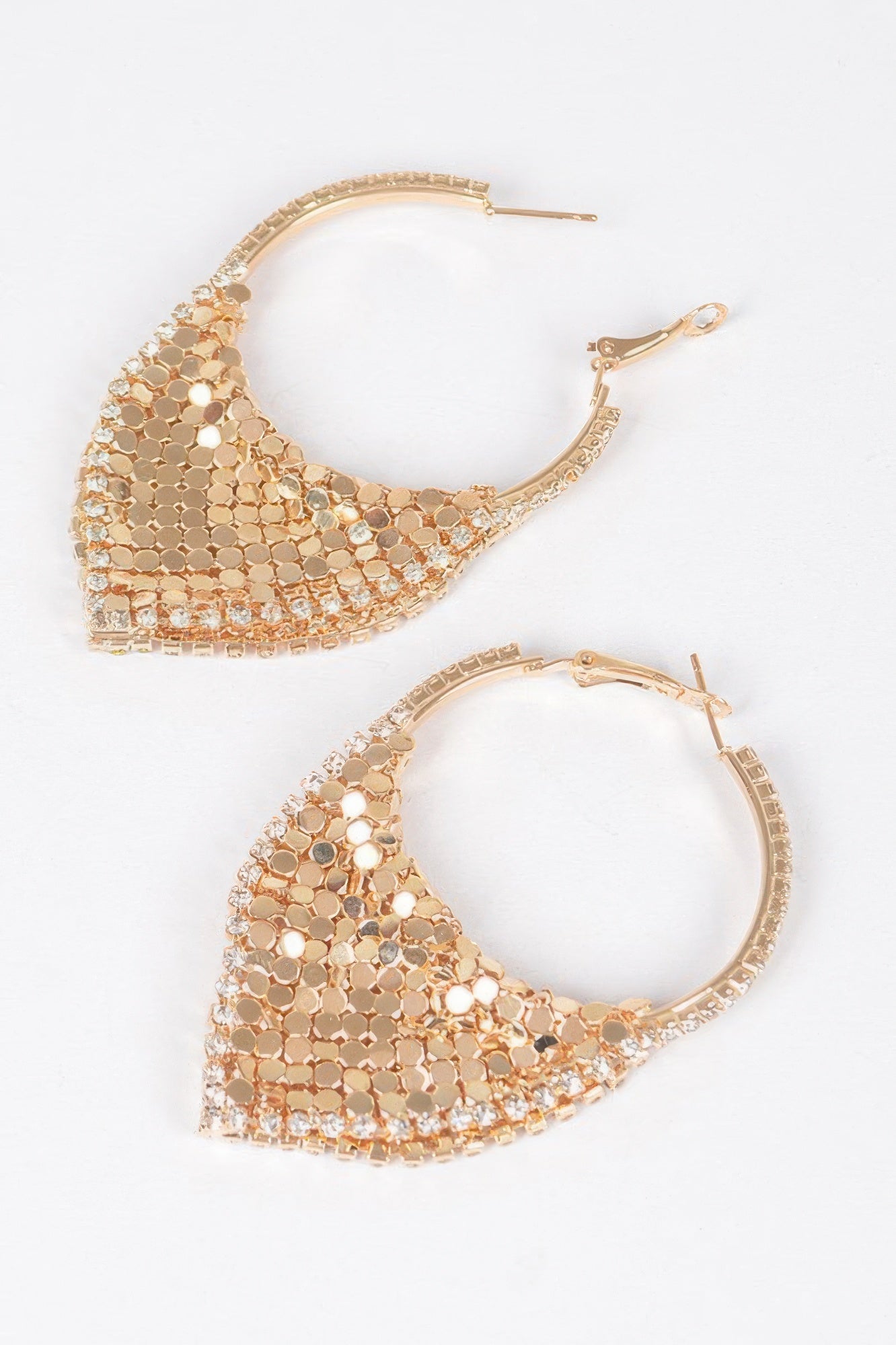 Gold-tone linked metal hoop earrings with dangling mesh triangle panels