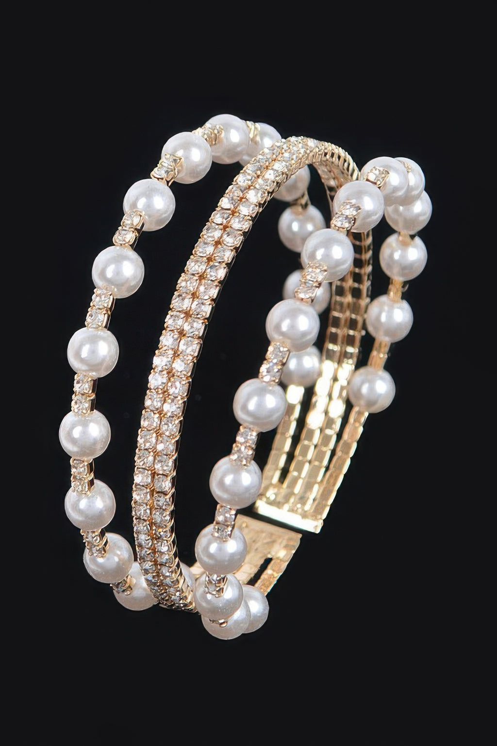 Gold-tone wire bracelet with round pearl beads and sparkling crystal bands