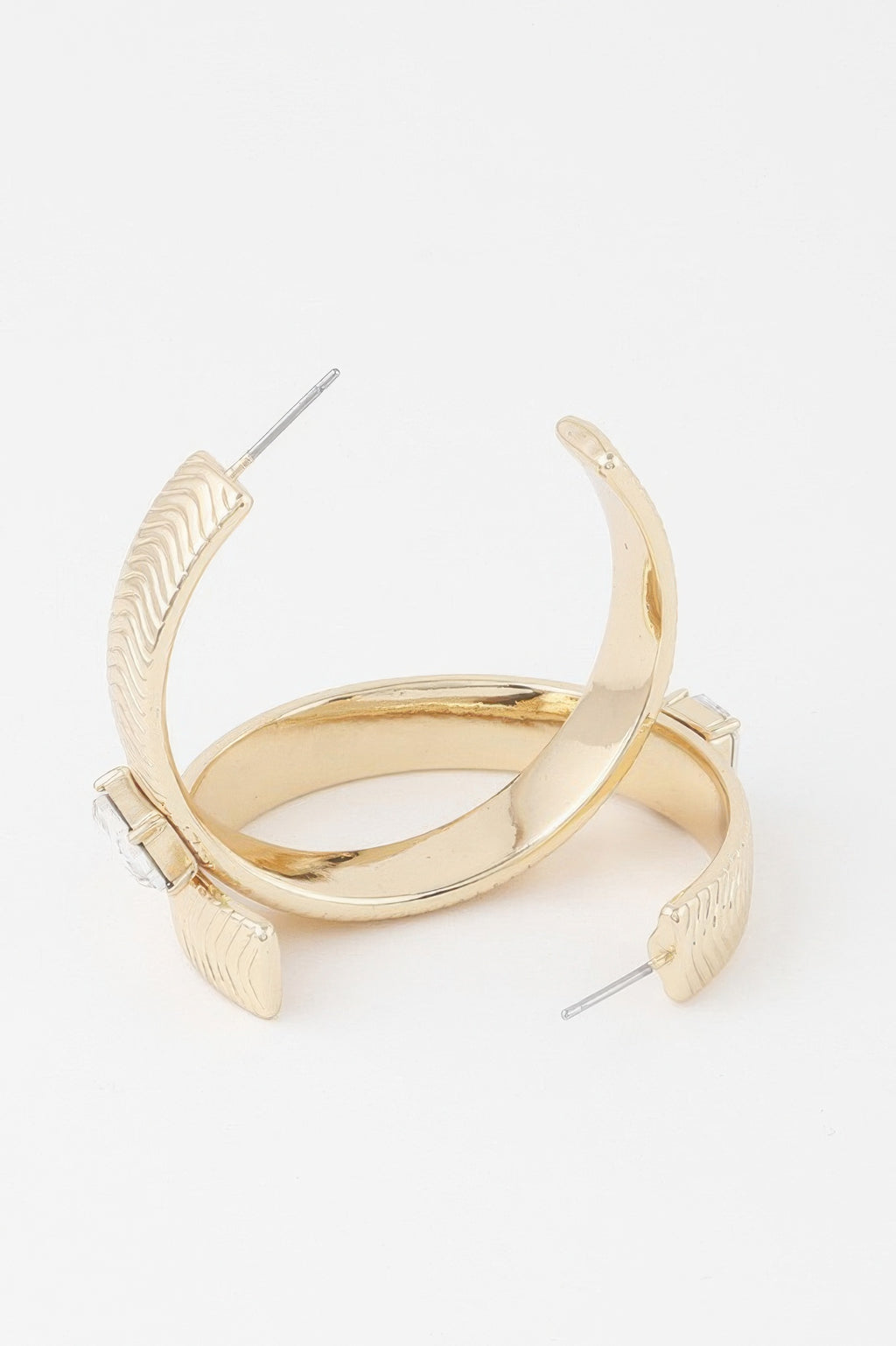 Gold hoop earrings with textured outer arc and small stud post