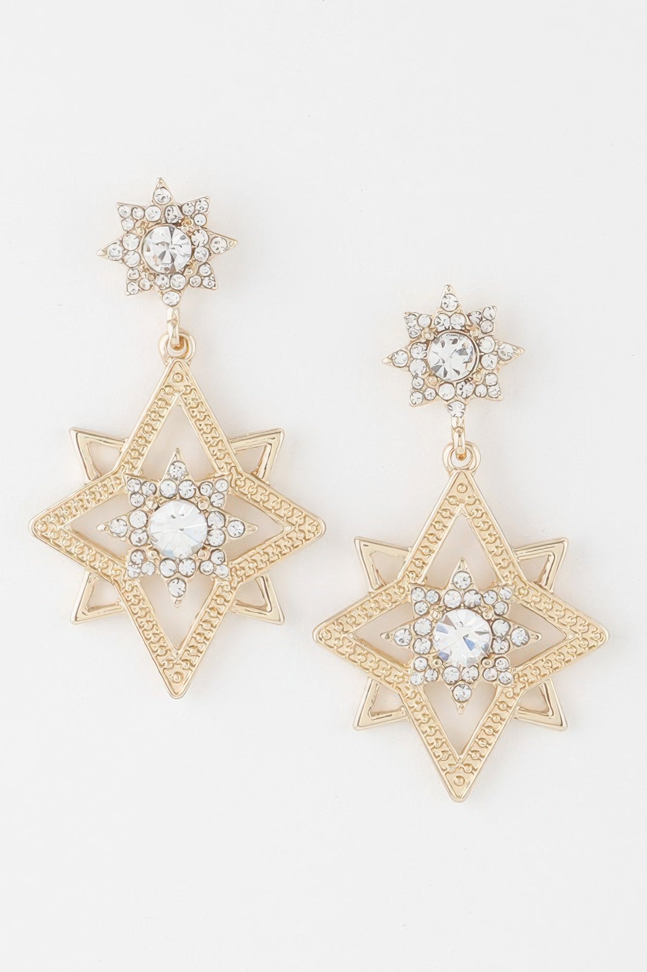 Shining Star dangle earrings in gold-tone with clear stones, star-shaped drop