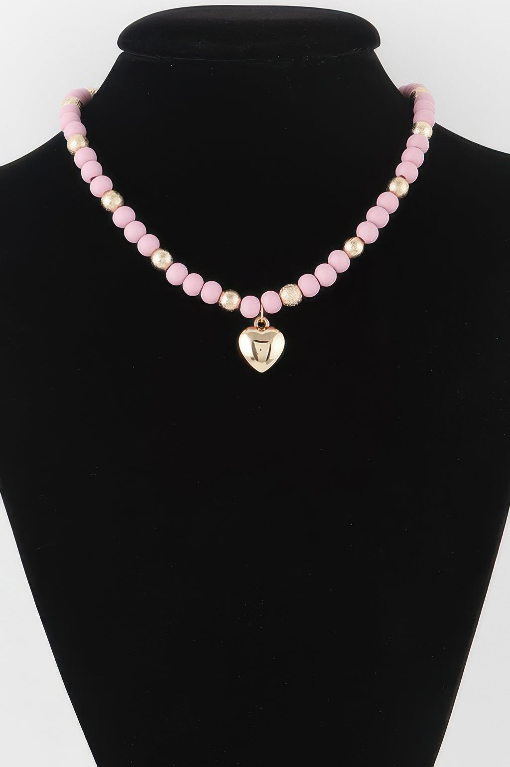 Pink beaded heart necklace with gold-tone heart pendant