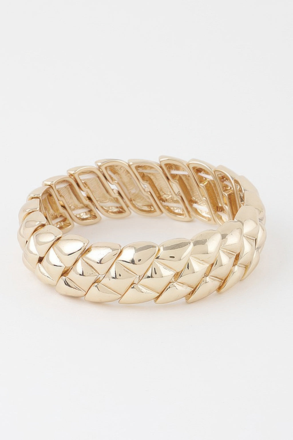 Gold-tone geometric cuff bracelet with curved row of polished rectangular links