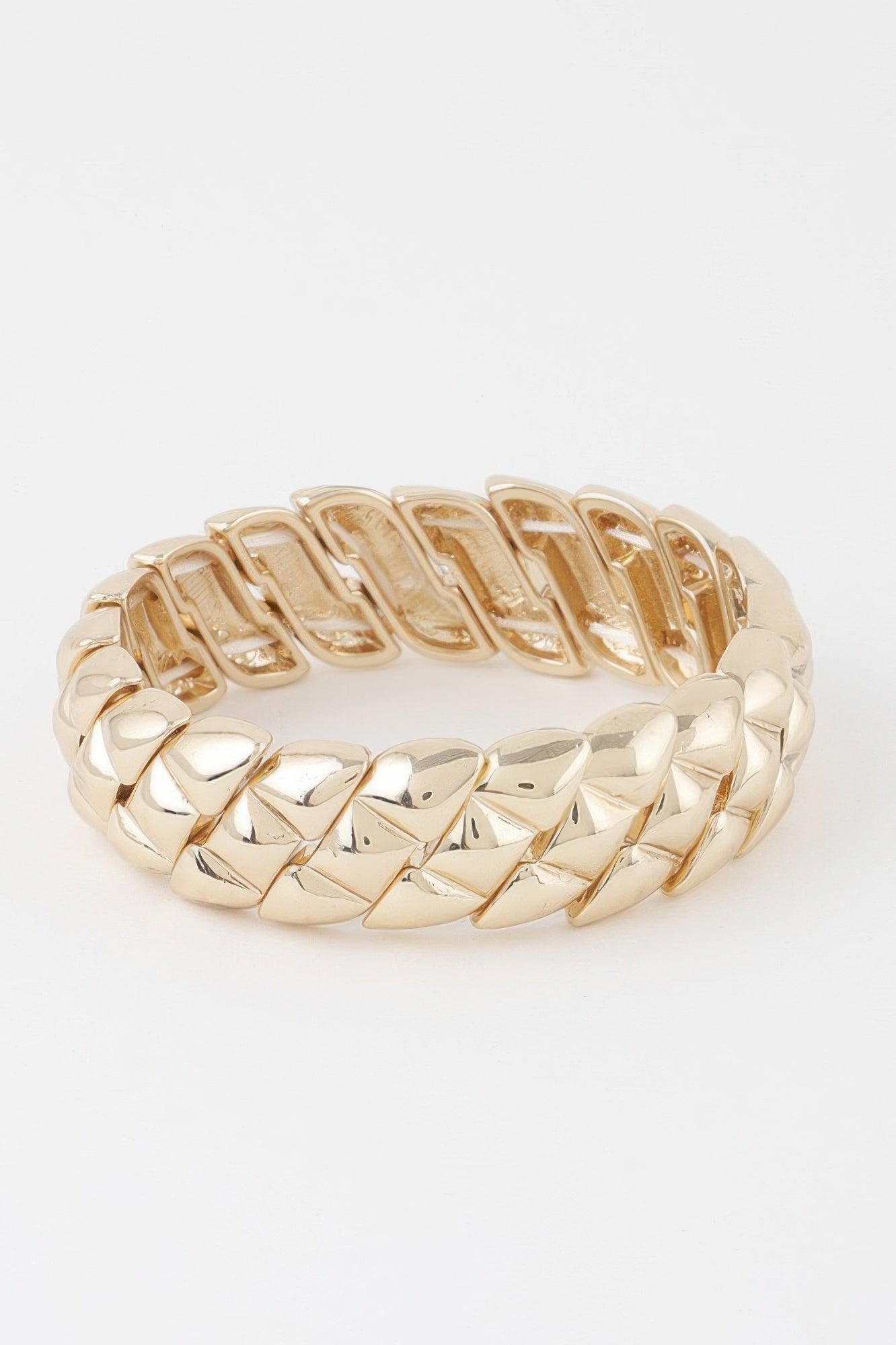 Gold-tone geometric cuff bracelet with curved row of polished rectangular links
