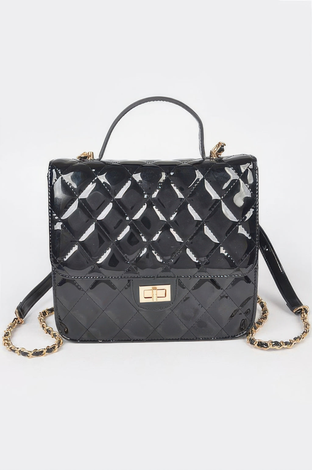 Quilted enamel backpack, black with glossy diamond pattern and top handle, gold-tone clasp