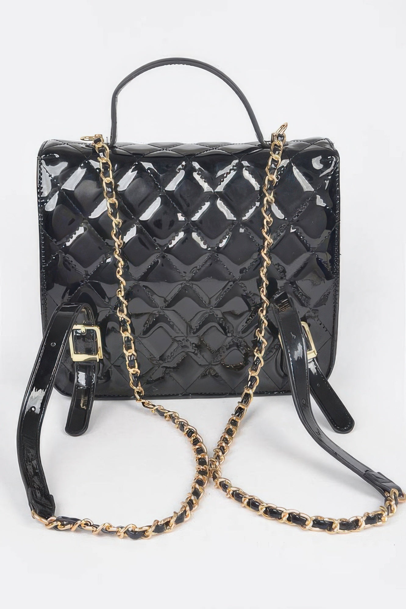 Black quilted enamel backpack front view with dual straps and gold-tone chain detail