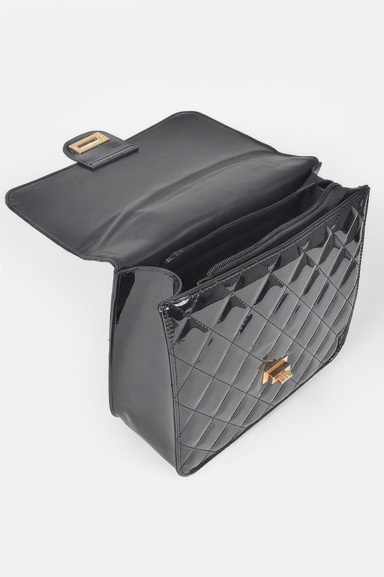 Black quilted enamel backpack open-looks design with front zipper and gold hardware