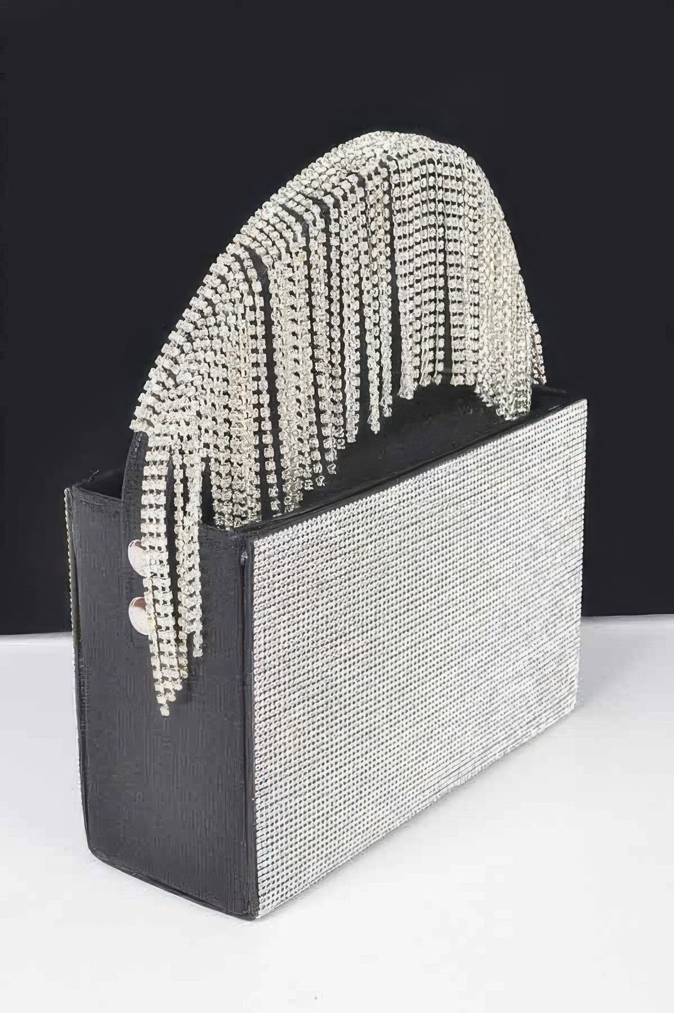 Rhinestone box clutch side view with black sides and clear crystal front