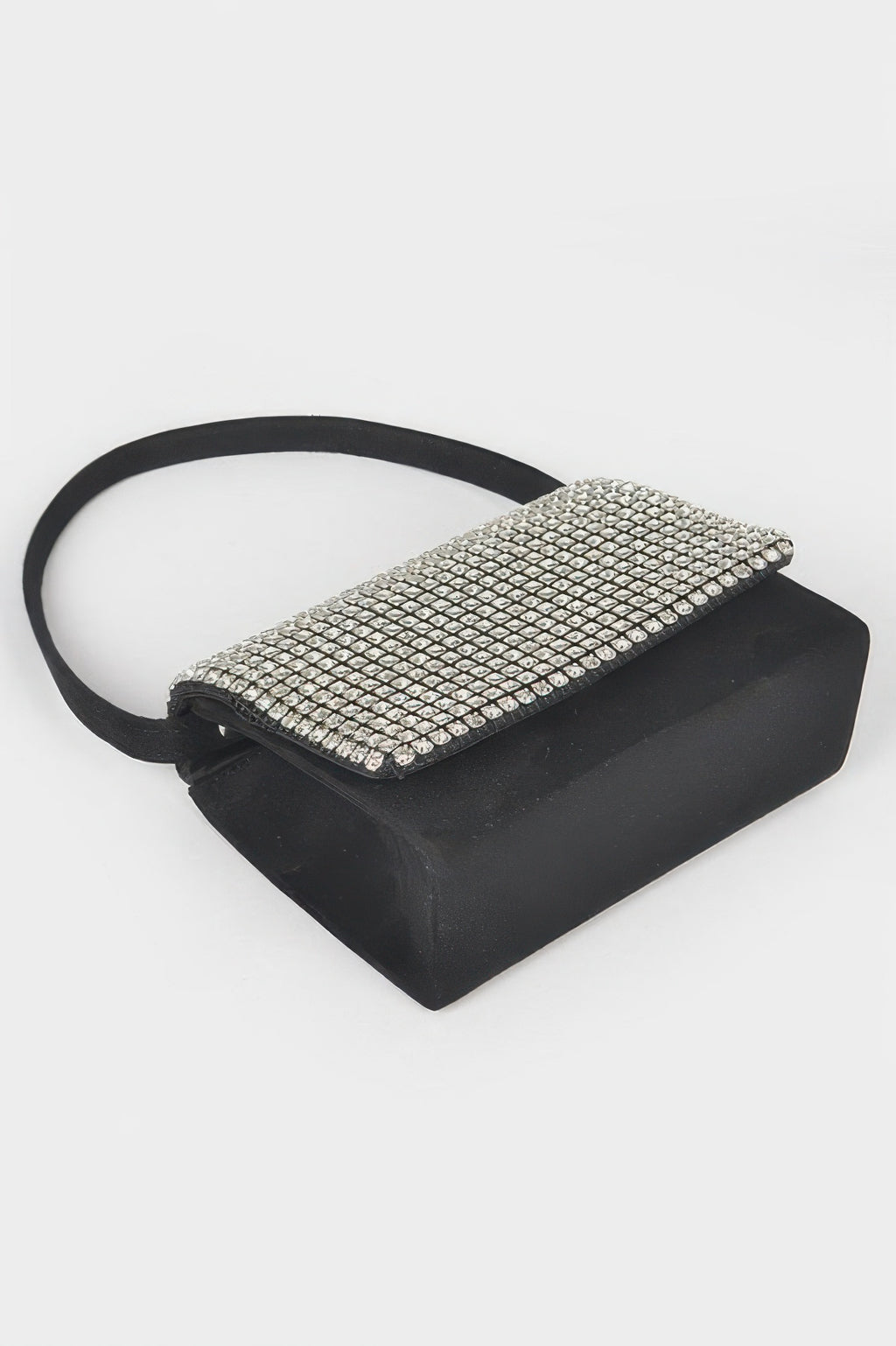 Black crossbody with silver rhinestone top band and curved handle strap