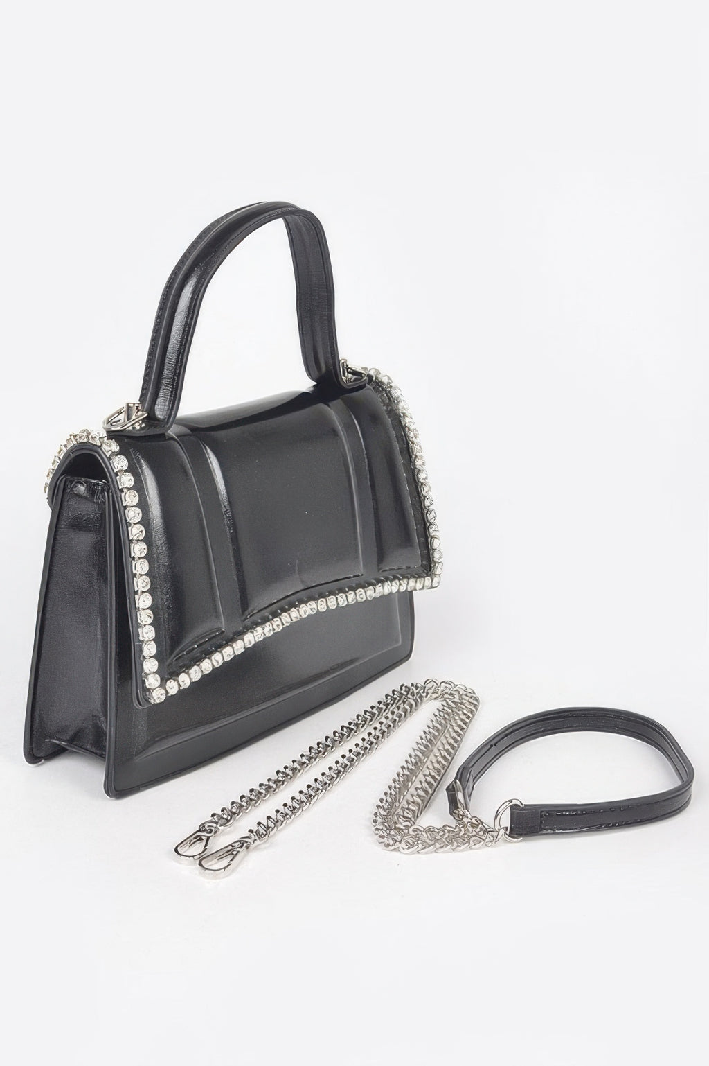 Black top-handle bag with glossy finish, rhinestone edge, and detachable chain strap