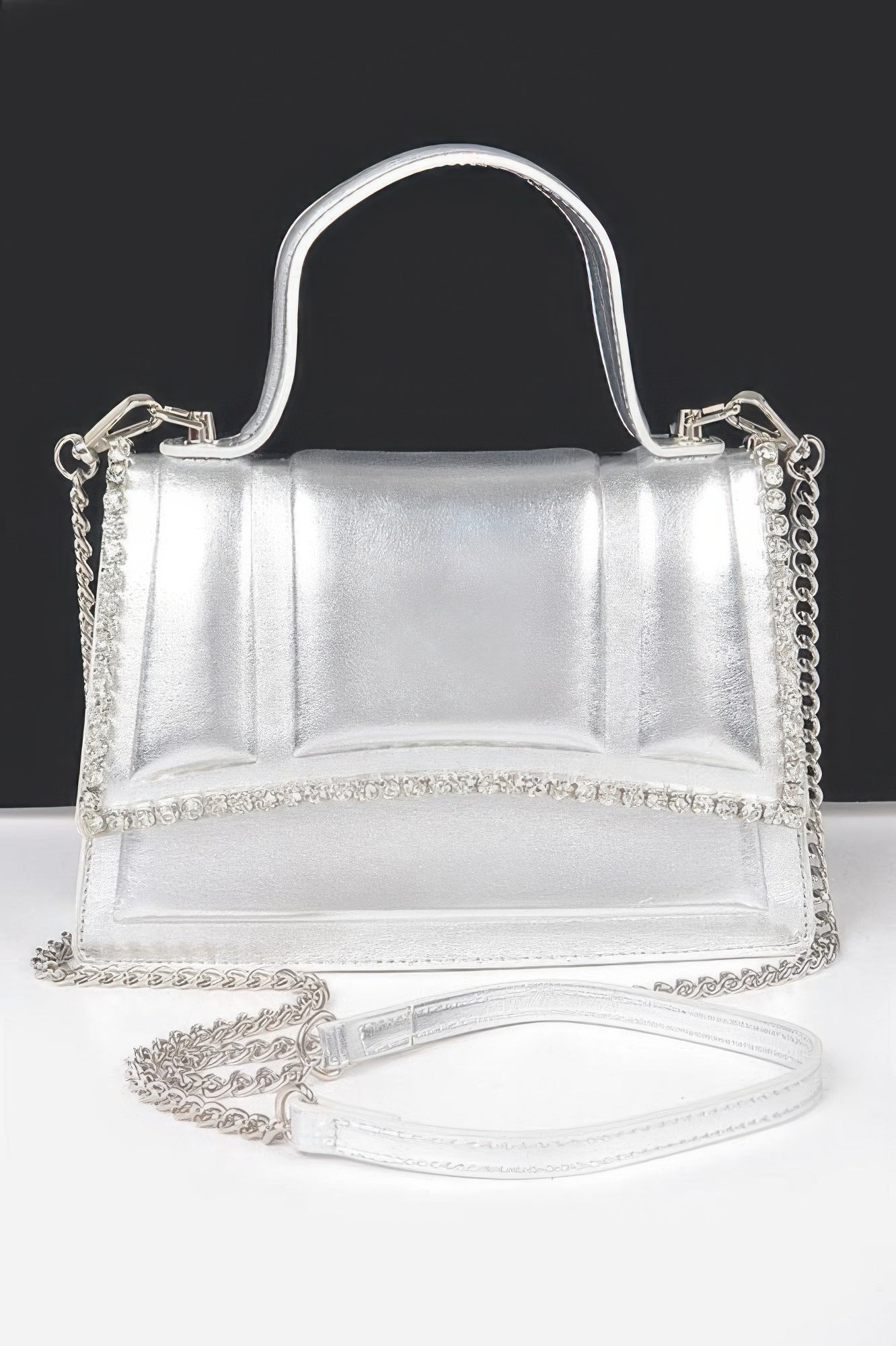 Silver faux metallic top-handle bag with rhinestone trim and chain strap
