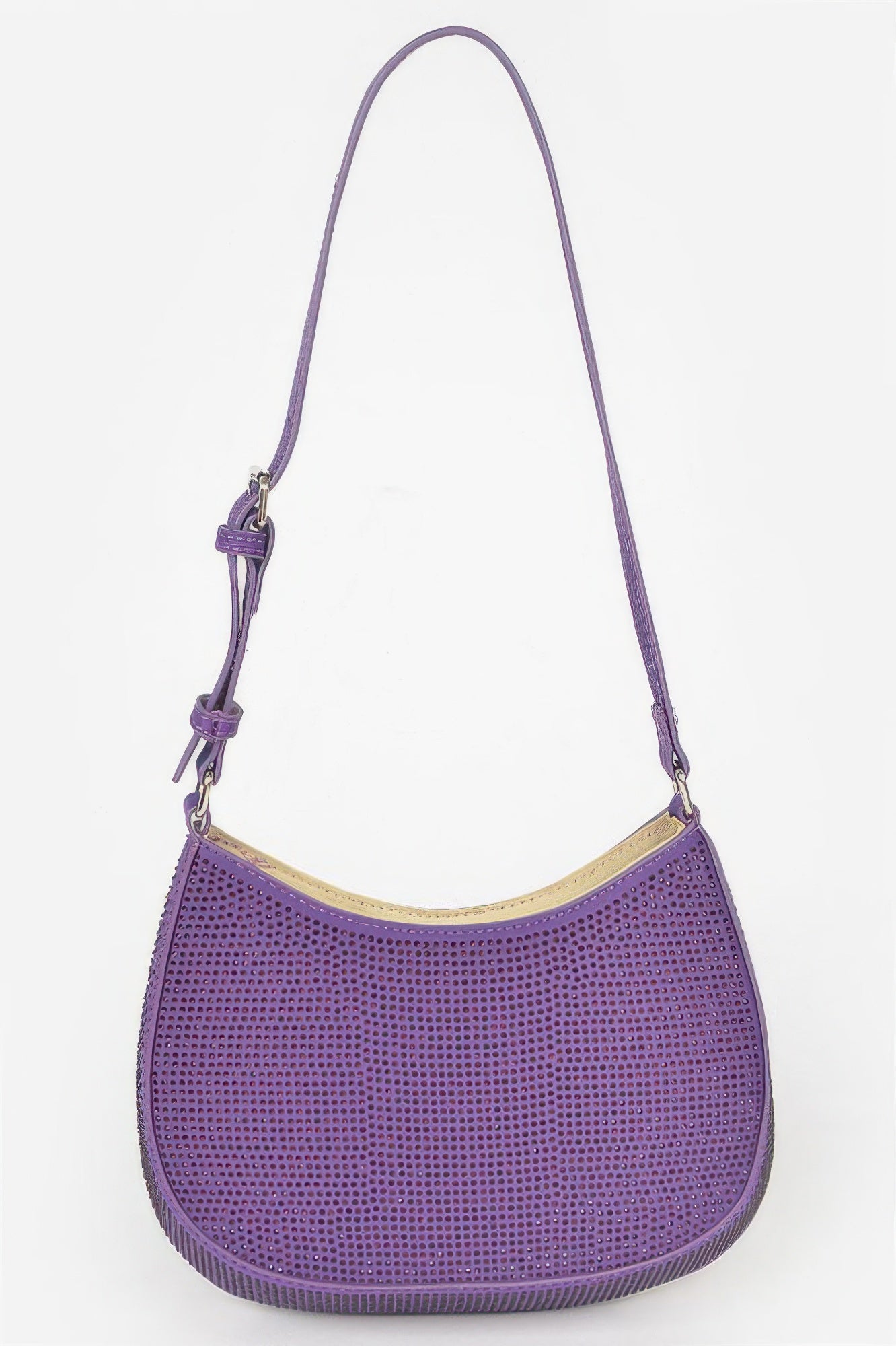 Purple hobo shoulder bag with textured surface, curved opening and adjustable shoulder strap